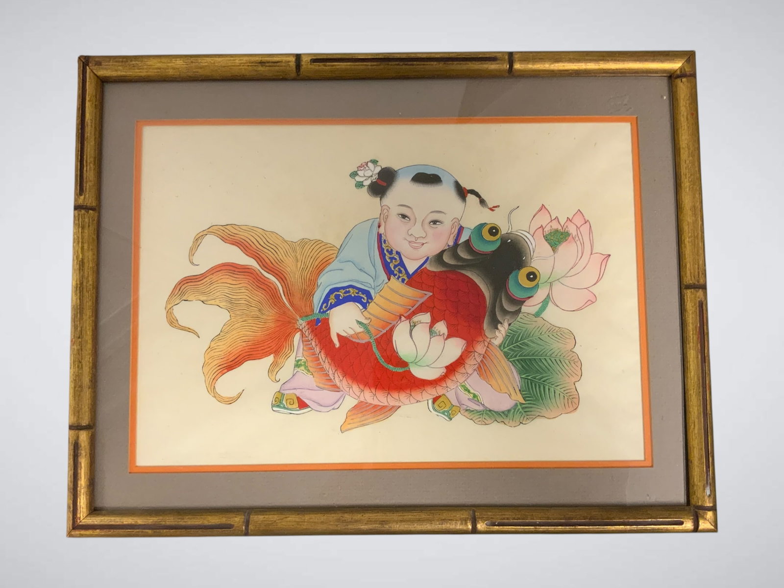 Asian New Year's Woodblock Print Vividly Hand-colored: Asian New Year's Woodblock Print Vividly Hand-colored. Again, this art is under glass. It appears to be as titled but the bidder will have to decide for themselves. Frame is wood made to look like bam