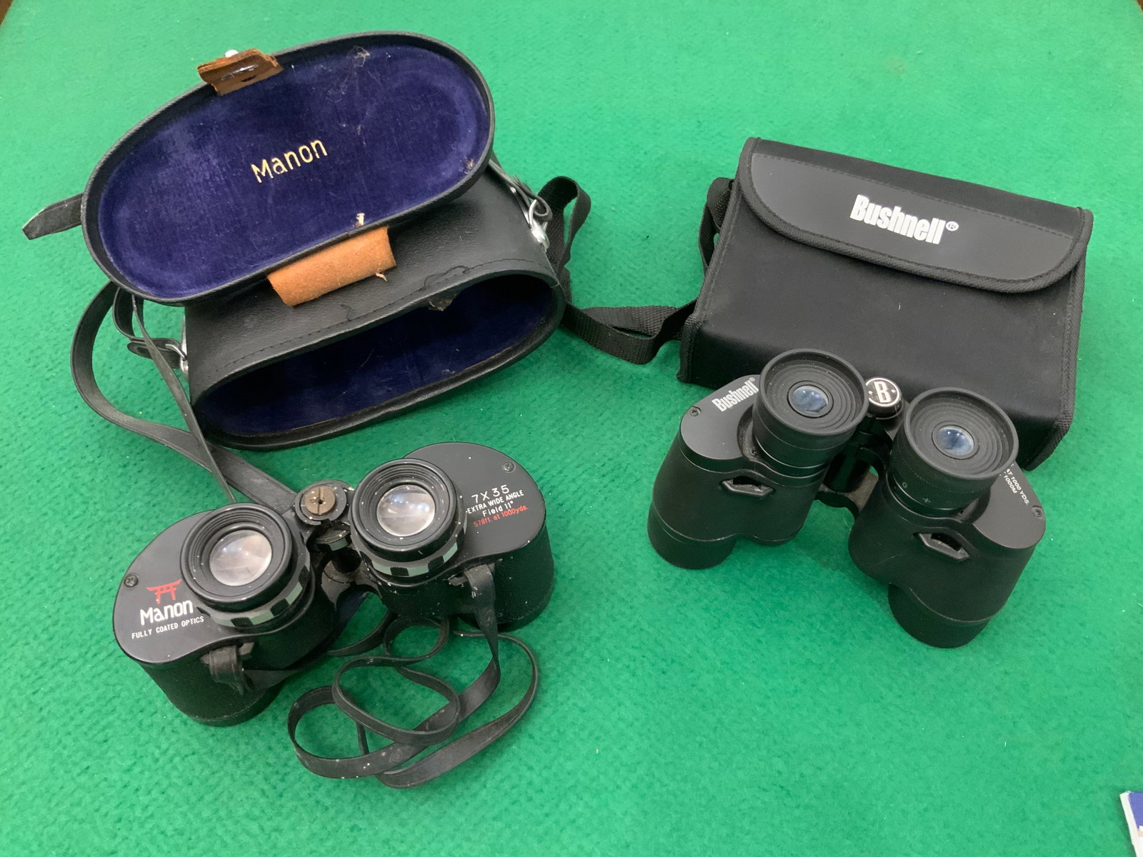 Bushnell Power View and Vtg Japanese Import Manon BINOCULARS: GET A SHIPPING QUOTE BEFORE YOU BID. .Bushnell Power View and Vtg Japanese Import Manon BINOCULARS. Manon offering shows some wear and has a leather case. Bushnell pair appears nearly unused and has a