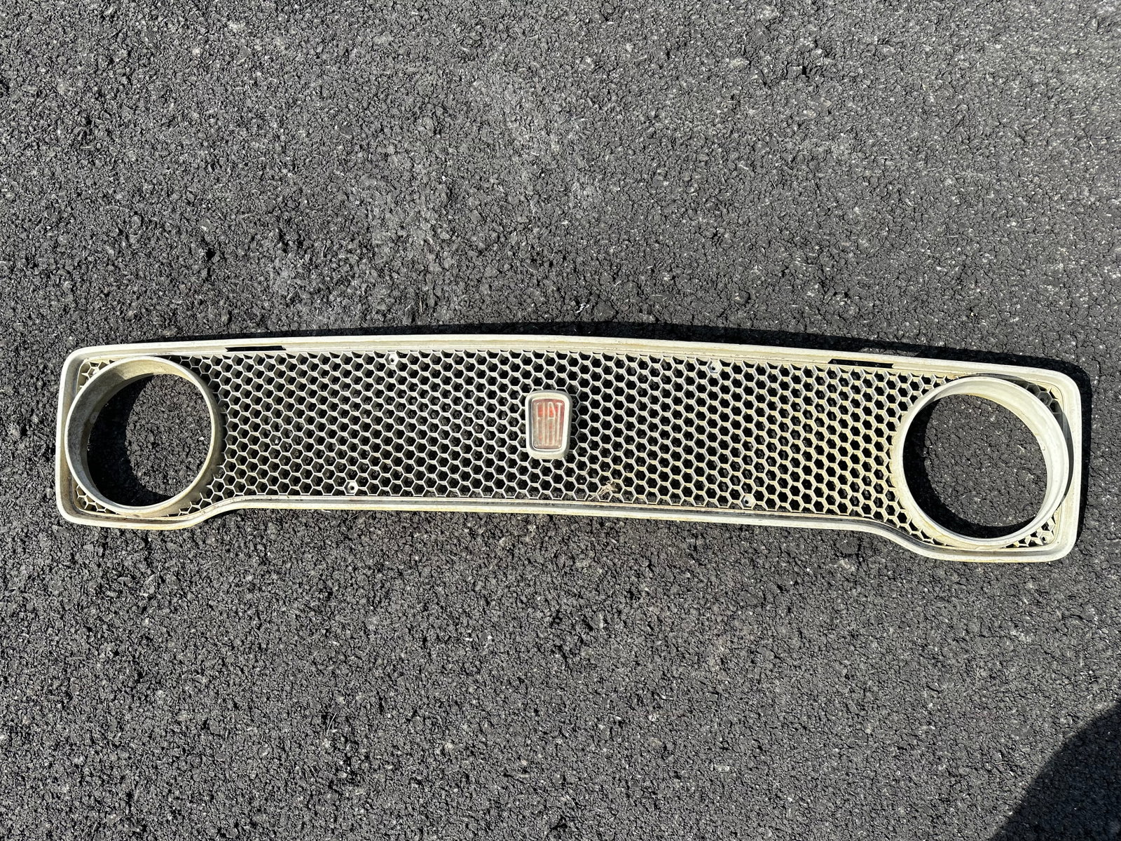 Vintage Fiat 128 GRILL: GET A SHIPPING QUOTE BEFORE YOU BID. .Vintage Fiat 128 GRILL. 9 1/2" x 49 1/2" .>>>>>>>>>>>>>>READ----READ----READ----Shipping for this lot is available ONLY THROUGH LIVEAUCTIONEERS/LIVESHIPPING. We