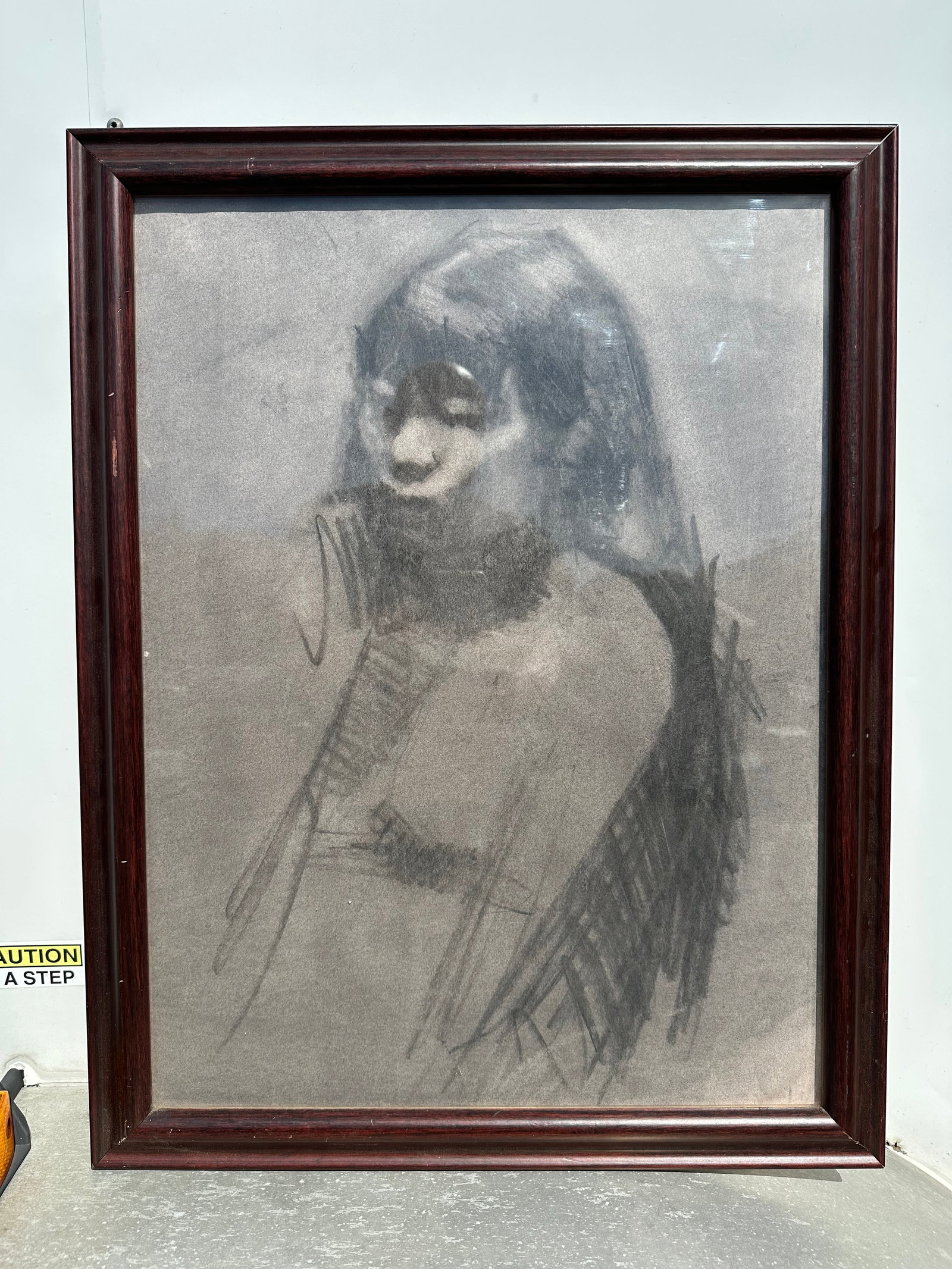 Framed Charcoal Portrait Under Glass: GET A SHIPPING QUOTE BEFORE YOU BID. . Framed Charcoal Portrait Under Glass. Looks like a charcoal but is under glass so bidder must decide. 21” x 27”.