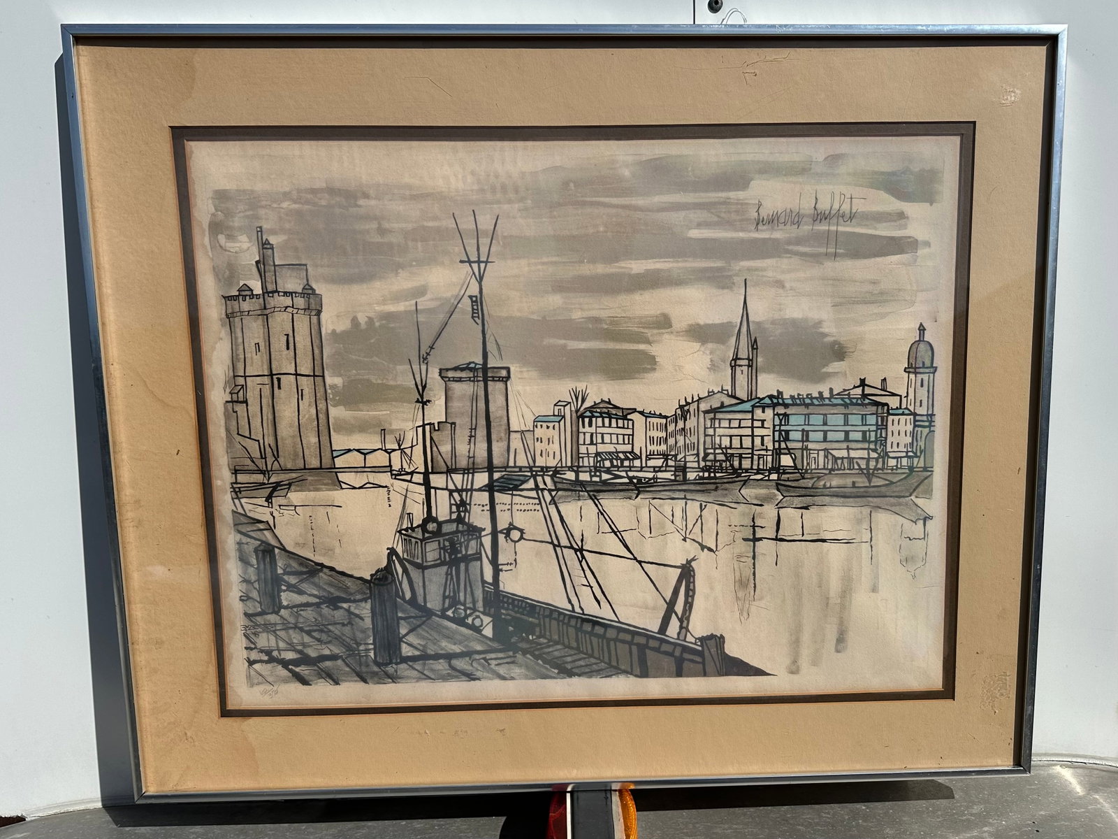 Vintage Framed Color Lithograph Print Le Port de La Rochelle by Bernard Buffet: GET A SHIPPING QUOTE BEFORE YOU BID. . Vintage Framed Color Lithograph Print Le Port de La Rochelle by Bernard Buffet. Has some minor water staining. 24 1/2” x 30 1/2”.