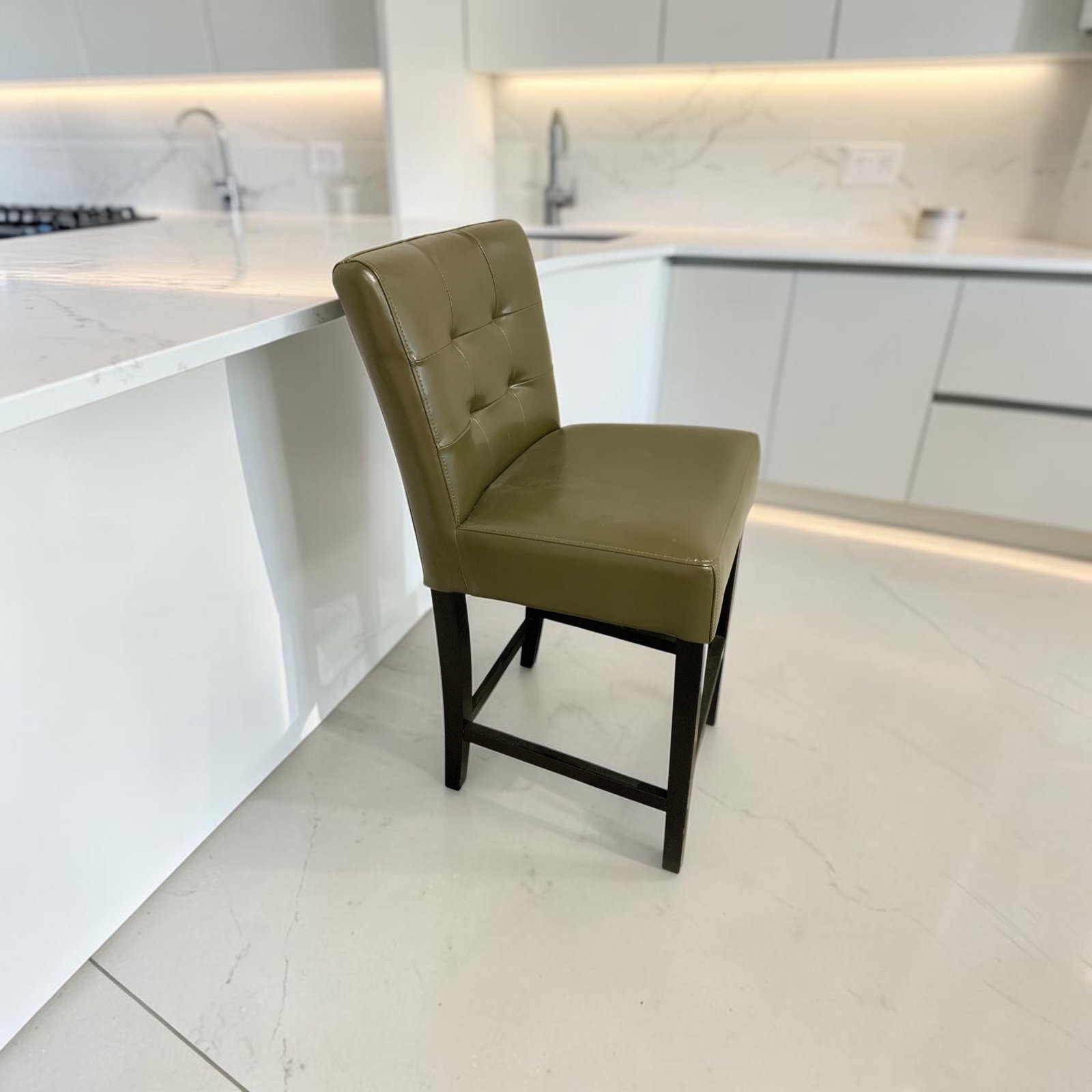 Tufted Olive Green Bar-height Counter Chair: GET A SHIPPING QUOTE BEFORE YOU BID. . Tufted Olive Green Bar-height Counter Chair. Overall 16" wide, 41 1/2" tall 19"front-to-back. .>>>>>>>>>>>>>>READ----READ----READ----Shipping for this lot is