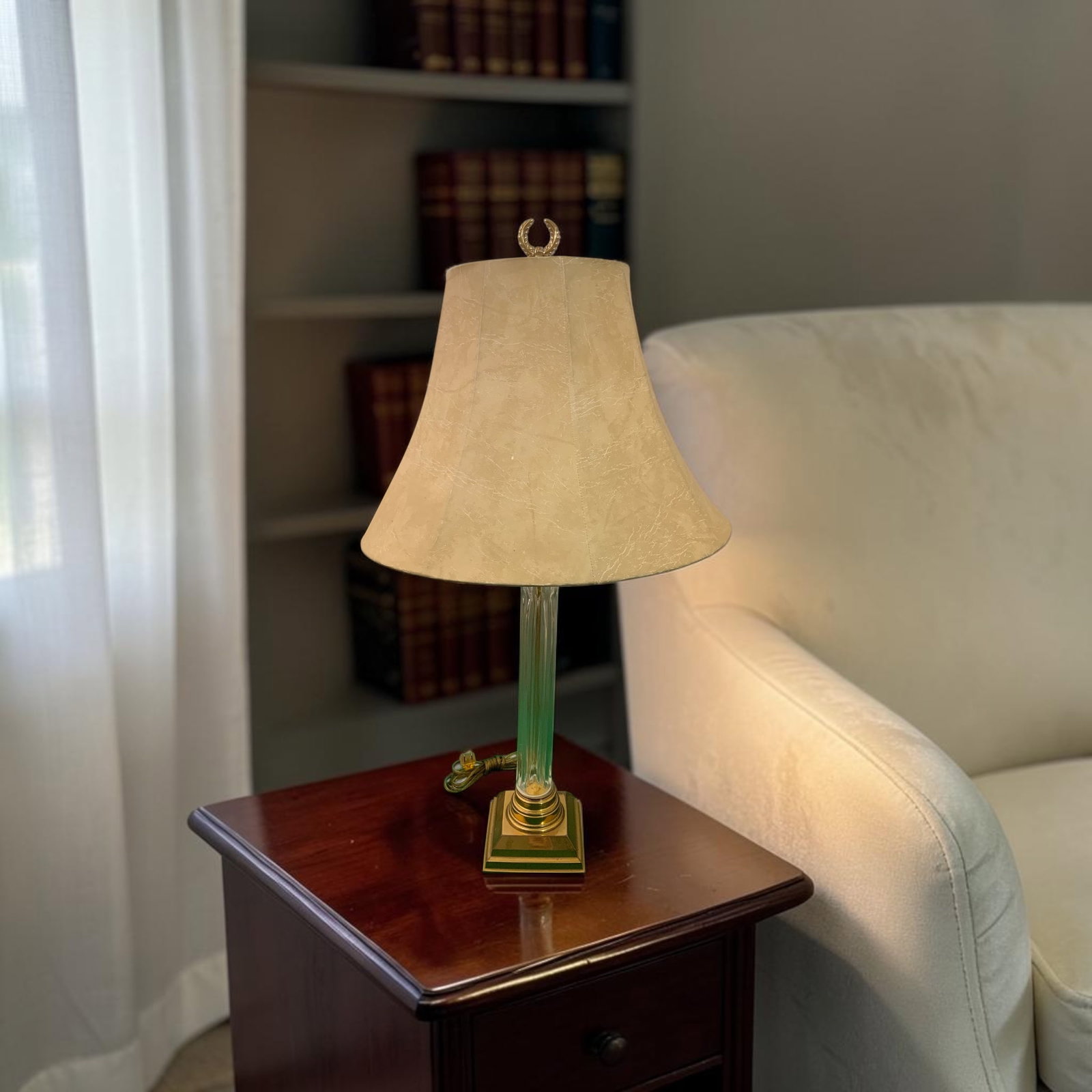 Vintage Neoclassical Table Lamp: GET A SHIPPING QUOTE BEFORE YOU BID. .Vintage Neoclassical Table Lamp. Brass finish base and capital with fluted glass column between. Finish on the base shows wear, mostly in the back. 24”tall 
