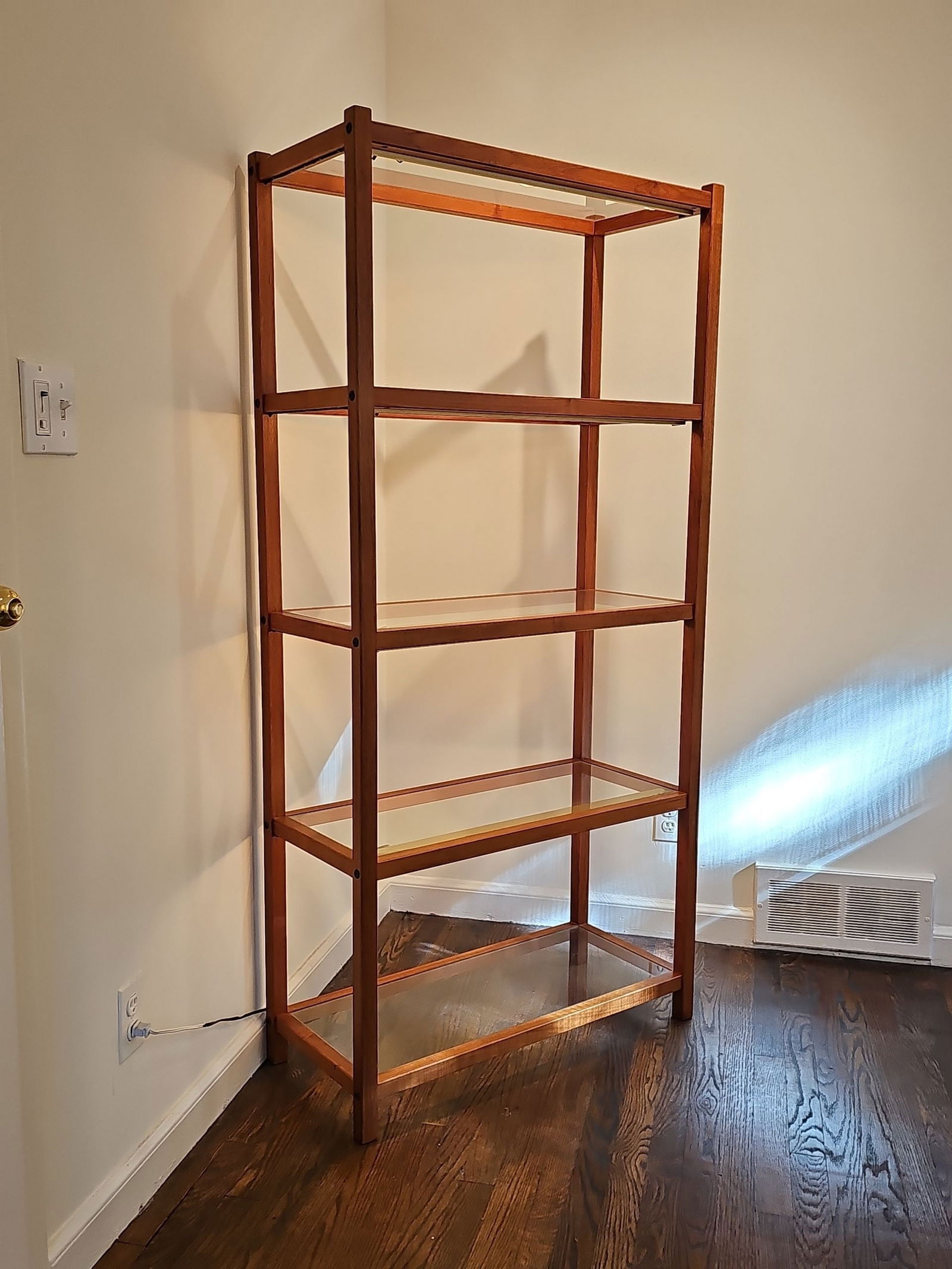 Danish Teak Wood Bookcase Etagere With Clear Glass Shelves and Lights Installed Under Each Shelf: Danish Teak Wood Bookcase Etagere With Clear Glass Shelves and Lights Installed Under Each Shelf 65"H X 31"W X 14"D BY BIDDING ON ANY ITEM, ALL BIDDERS ARE ENTERING INTO A CONTRACT AND AGREE TO ABIDE