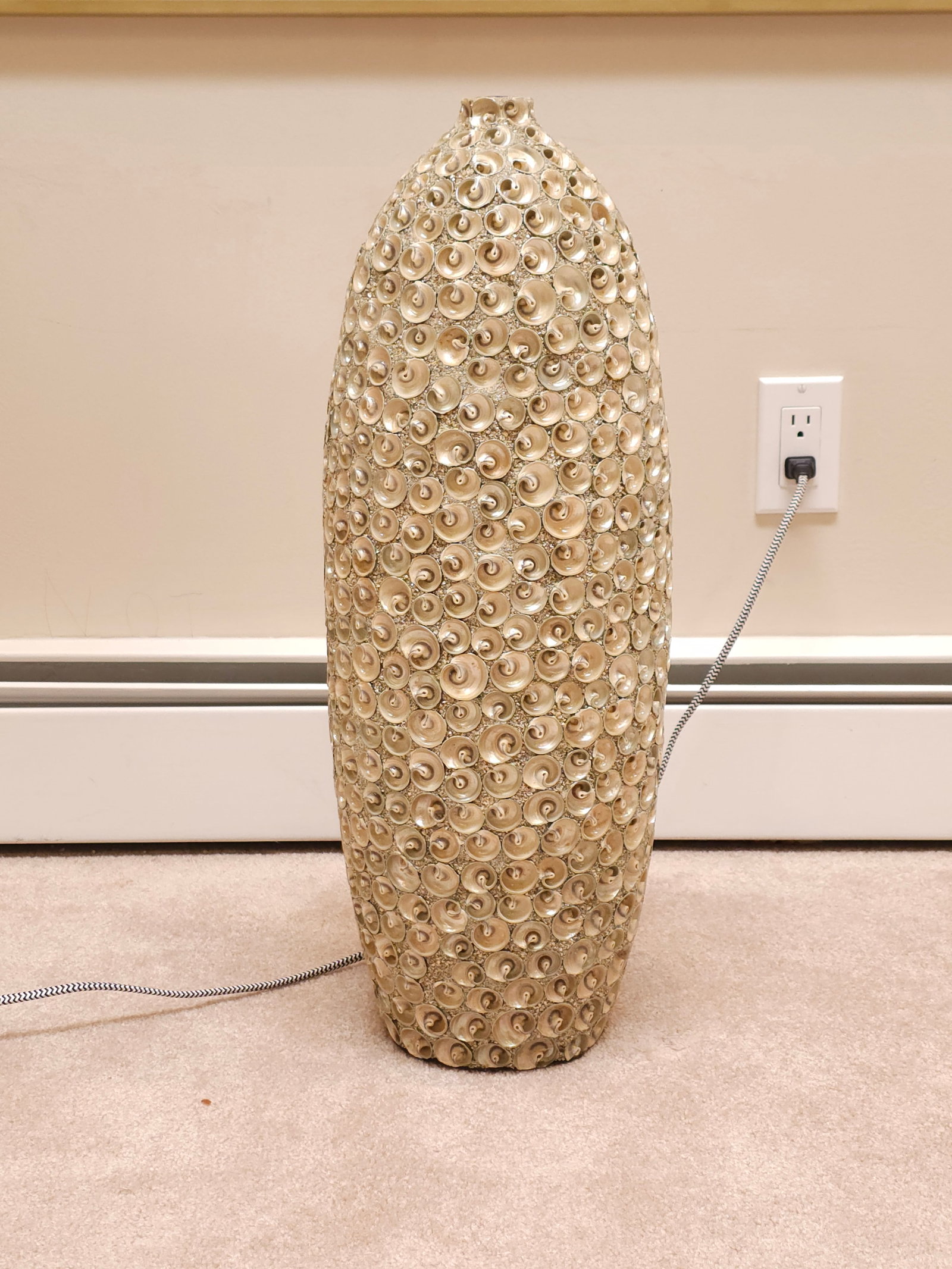 Beautiful shell vase 25": Beautiful shell vase 25"BY REGISTERING FOR THIS SALE AND BIDDING ON ANY ITEM, ALL BIDDERS ARE ENTERING INTO A CONTRACT AND AGREE TO ABIDE BY AND ACCEPT THESE TERMS OF SALE. PLEASE READ THESE TERMS AND