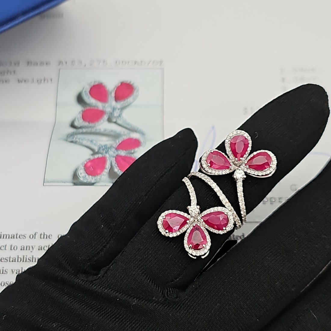 18 K White Gold Hand Assembled Ruby And Diamond Floral Design Ring W/Certificate of Appraisal CERT#: 18 K White Gold Hand Assembled Ruby And Diamond Floral Design Ring 18 K White Gold Hand Assembled Ruby And Diamond Floral Design Ring W/Certificate of Appraisal CERT#X07389 Total Diamond Weight - 1.59