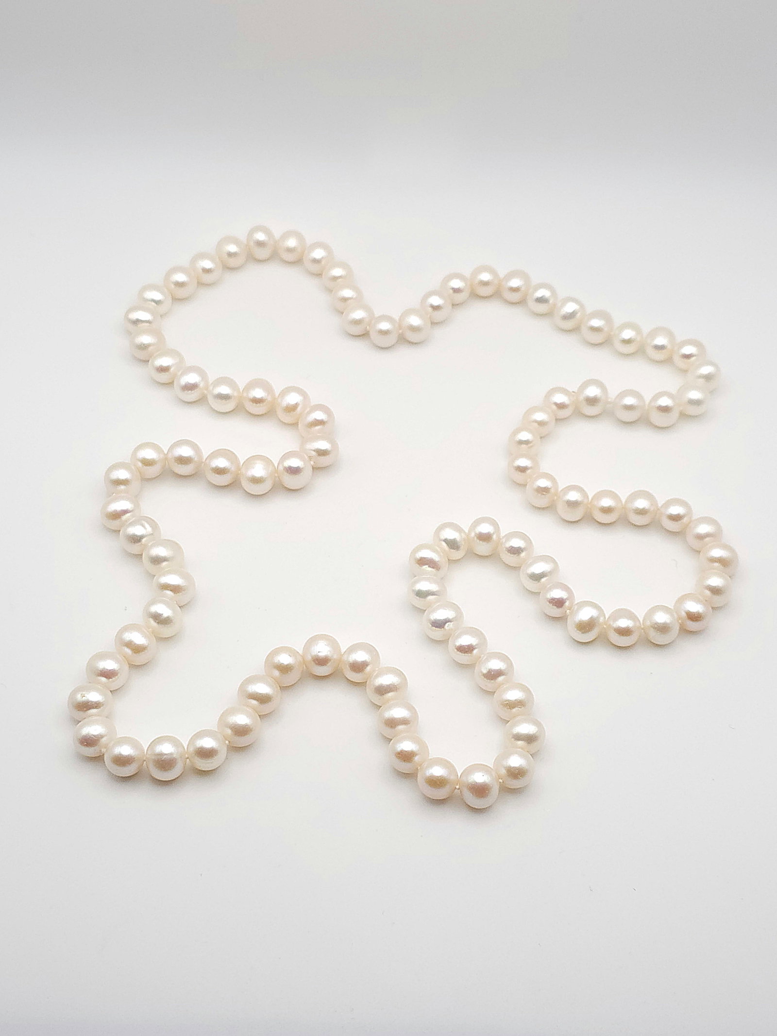Natural 5.0/5.5 mm Pearl Necklace 34" Long: Natural 5.0/5.5 mm Pearl Necklace 34" Long.BY REGISTERING FOR THIS SALE AND BIDDING ON ANY ITEM, ALL BIDDERS ARE ENTERING INTO A CONTRACT AND AGREE TO ABIDE BY AND ACCEPT THESE TERMS OF SALE. PLEASE R