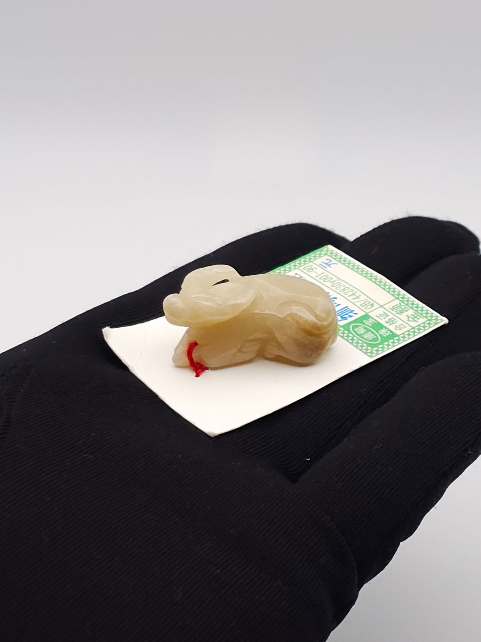 Hand Carved Chinese Water Buffalo Jade Figurine: Hand Carved Chinese Water Buffalo Jade FigurineBY REGISTERING FOR THIS SALE AND BIDDING ON ANY ITEM, ALL BIDDERS ARE ENTERING INTO A CONTRACT AND AGREE TO ABIDE BY AND ACCEPT THESE TERMS OF SALE. PLEA