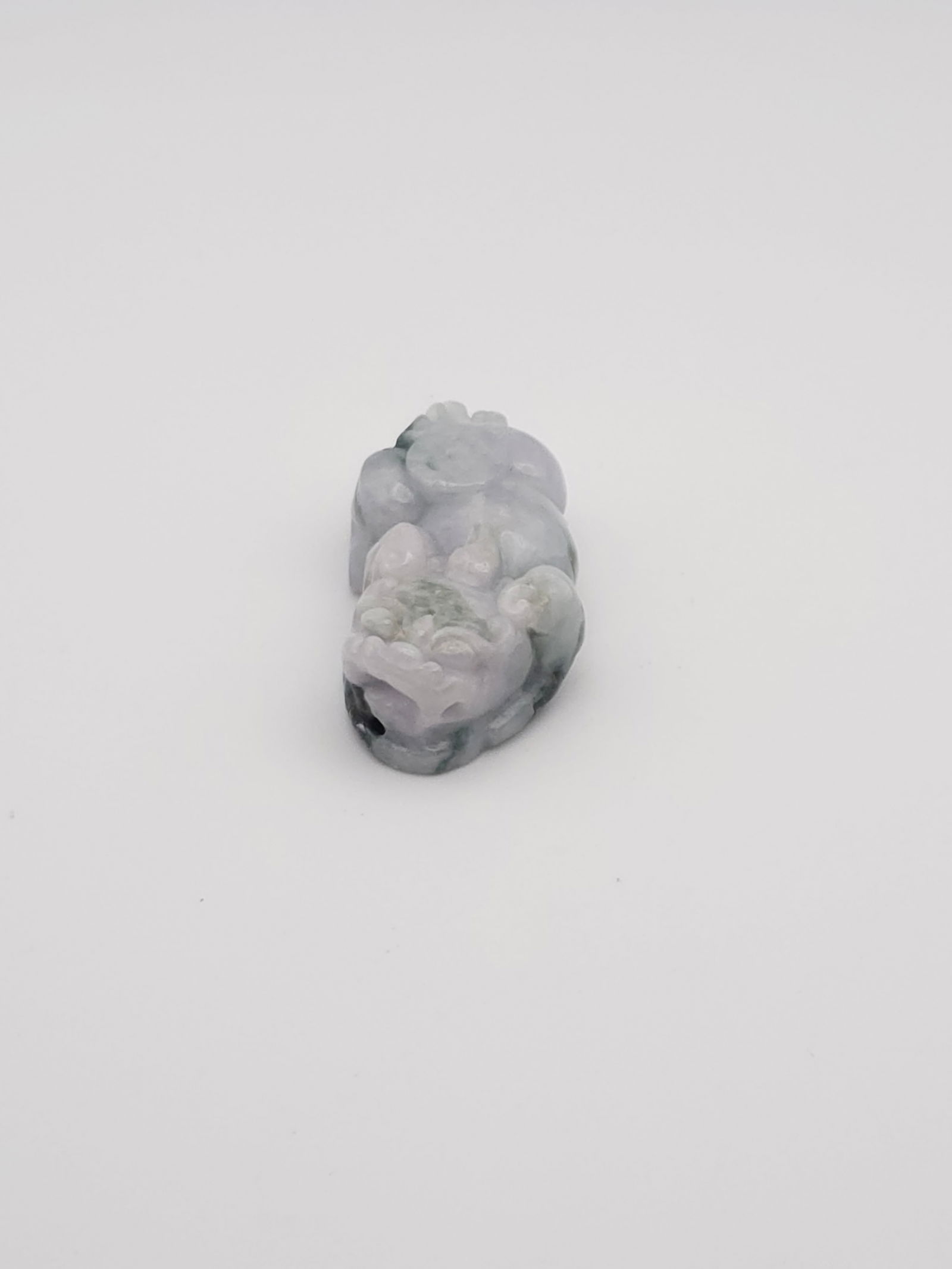 Hand Carved Chinese Foo Dog Jade Amulet Figurine: Hand Carved Chinese Foo Dog Jade Amulet FigurineBY REGISTERING FOR THIS SALE AND BIDDING ON ANY ITEM, ALL BIDDERS ARE ENTERING INTO A CONTRACT AND AGREE TO ABIDE BY AND ACCEPT THESE TERMS OF SALE. PLE