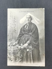 A postcard of traditional costumes from Brittany, France