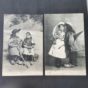 Old postcard featuring traditional French costumes from the late 19th century