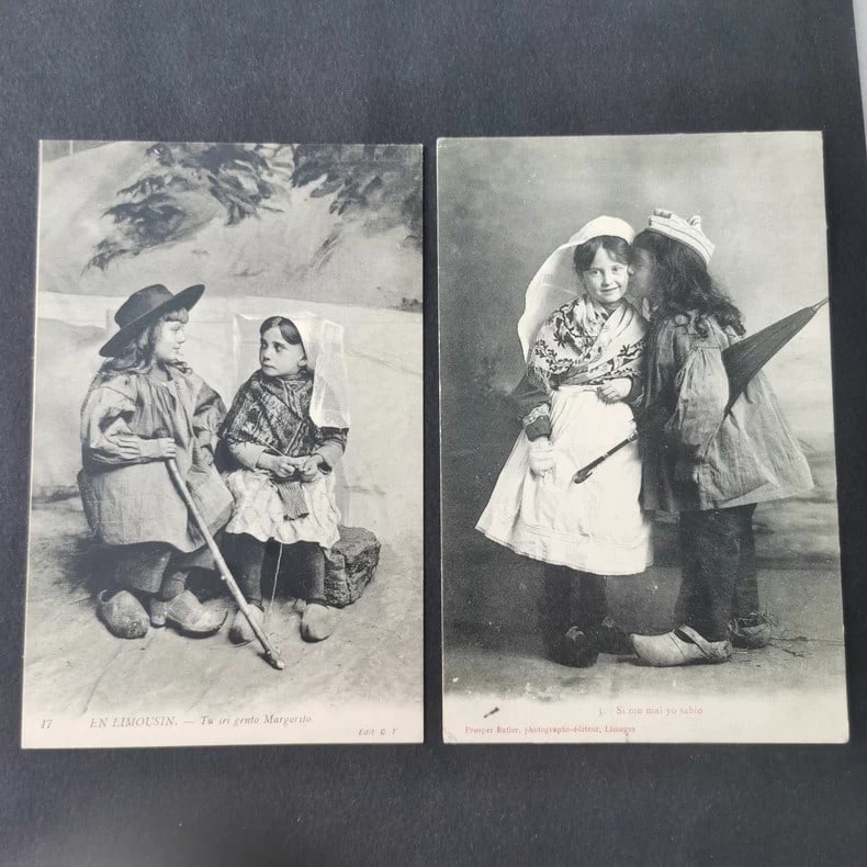 Old postcard featuring traditional French costumes from the late 19th century (1 of 2)