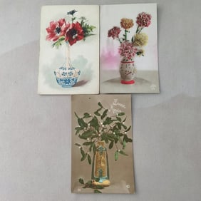 A set of old European postcards with floral themes from the late 19th century