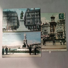 A set of three postcards depicting late 19th-century architecture