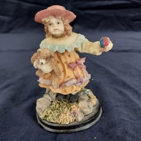 Vintage Figurine of Girl with Teddy