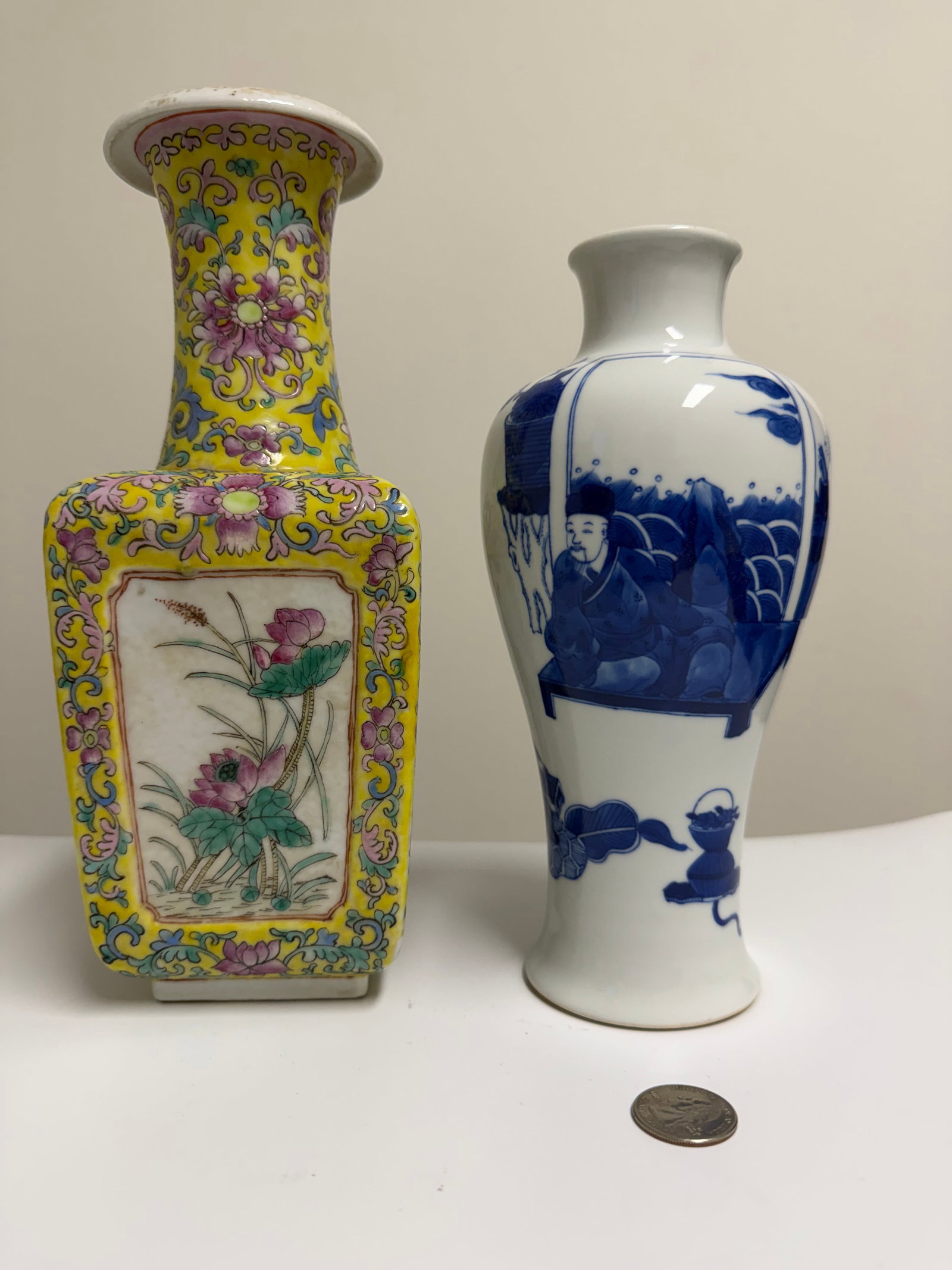 Set Of 2 PCS Famille Rose & Blue And White Porcelain Vases: Dimension: H 9.9/8.5 inches/ 25.2/21.6 cm, please note Due to manual measurement, dimensions may vary. Condition: Good used condition, the famille rose vase has a chip, please note buyers are obligate