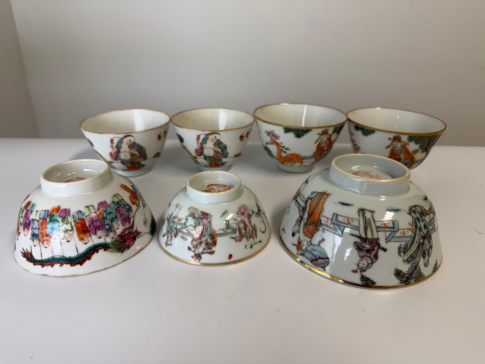 Set of 7 Chinese famille rose pocelain China tea cups: Dimension: 3.3-4.9 inch / 8.8-9.9 cm , please note Due to manual measurement, dimensions may vary. Condition: Good used condition, please note buyers are obligated to come to the site to inspect the