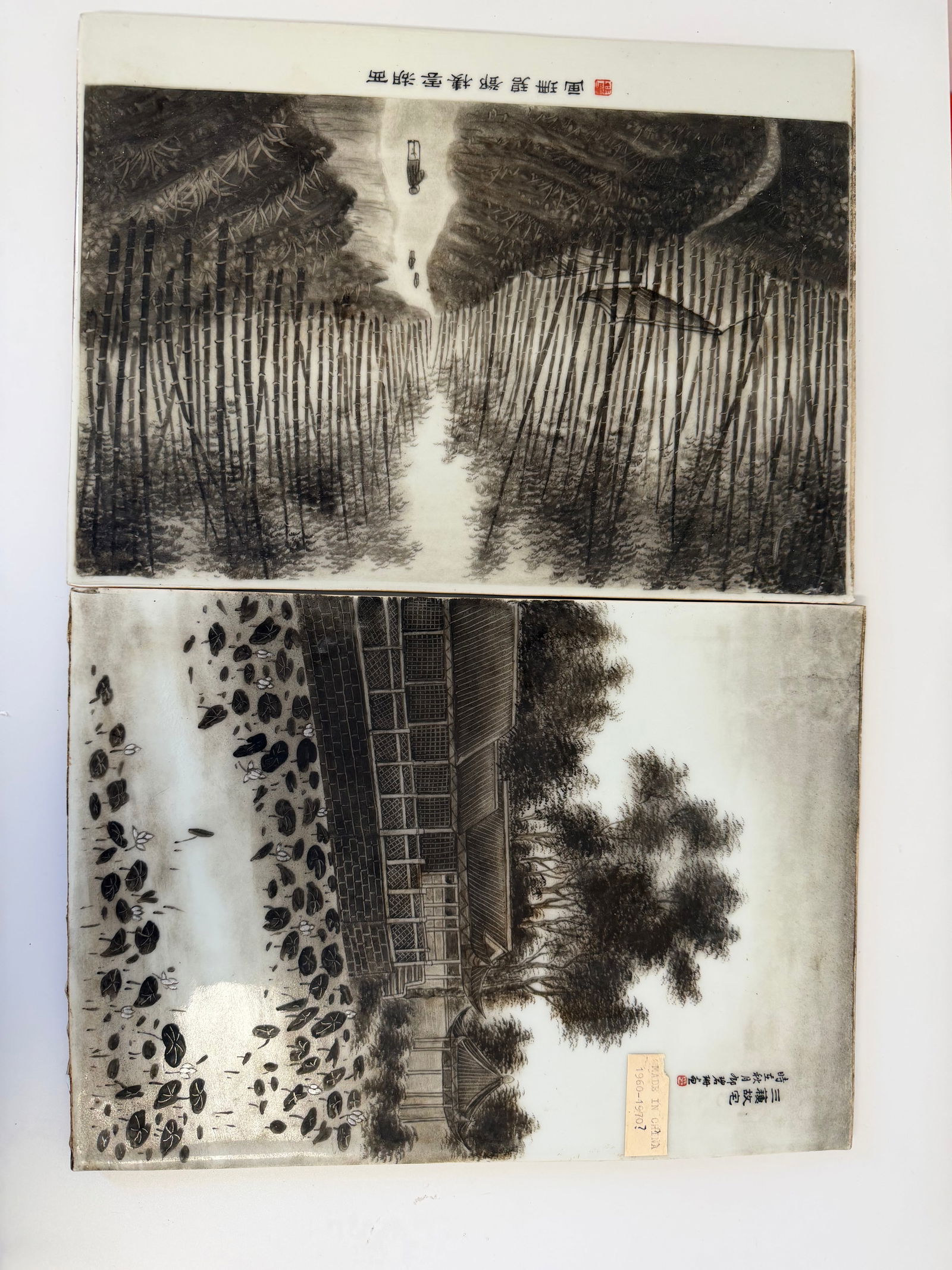Set of 2 Chinese black and white porcelain landscape plaque China characters mark: Dimension: 8.8x12.3 inch / 23.3x31 cm , please note Due to manual measurement, dimensions may vary. Condition: Good used condition, please note buyers are obligated to come to the site to inspect the