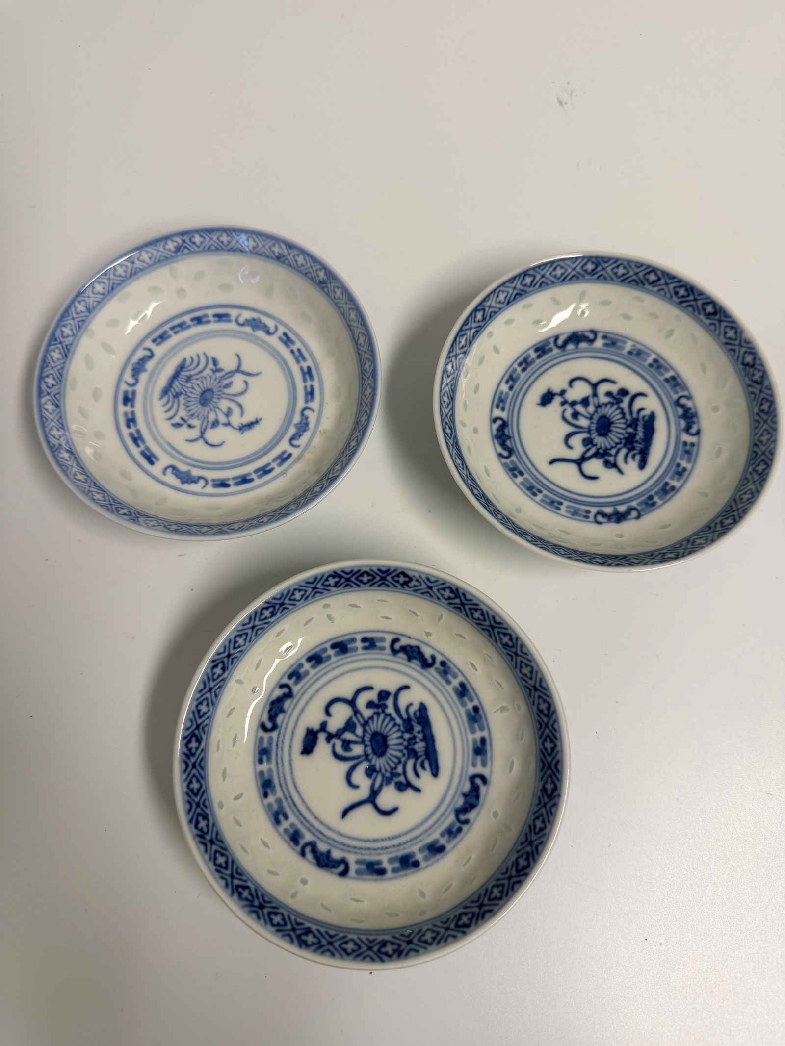 Set of 3 Chinese blue and white rice saucers: Dimension: 3.8 inch / 9.6 cm , please note Due to manual measurement, dimensions may vary. Condition: Good used condition, please note buyers are obligated to come to the site to inspect the