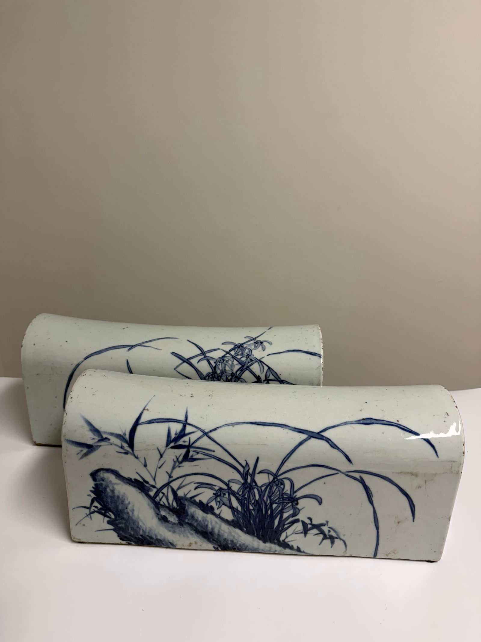 Pair of large Chinese blue and white orchid Pillows: Dimension: 14.8 inch / 37.6 cm , please note Due to manual measurement, dimensions may vary. Condition: Good used condition, please note buyers are obligated to come to the site to inspect the