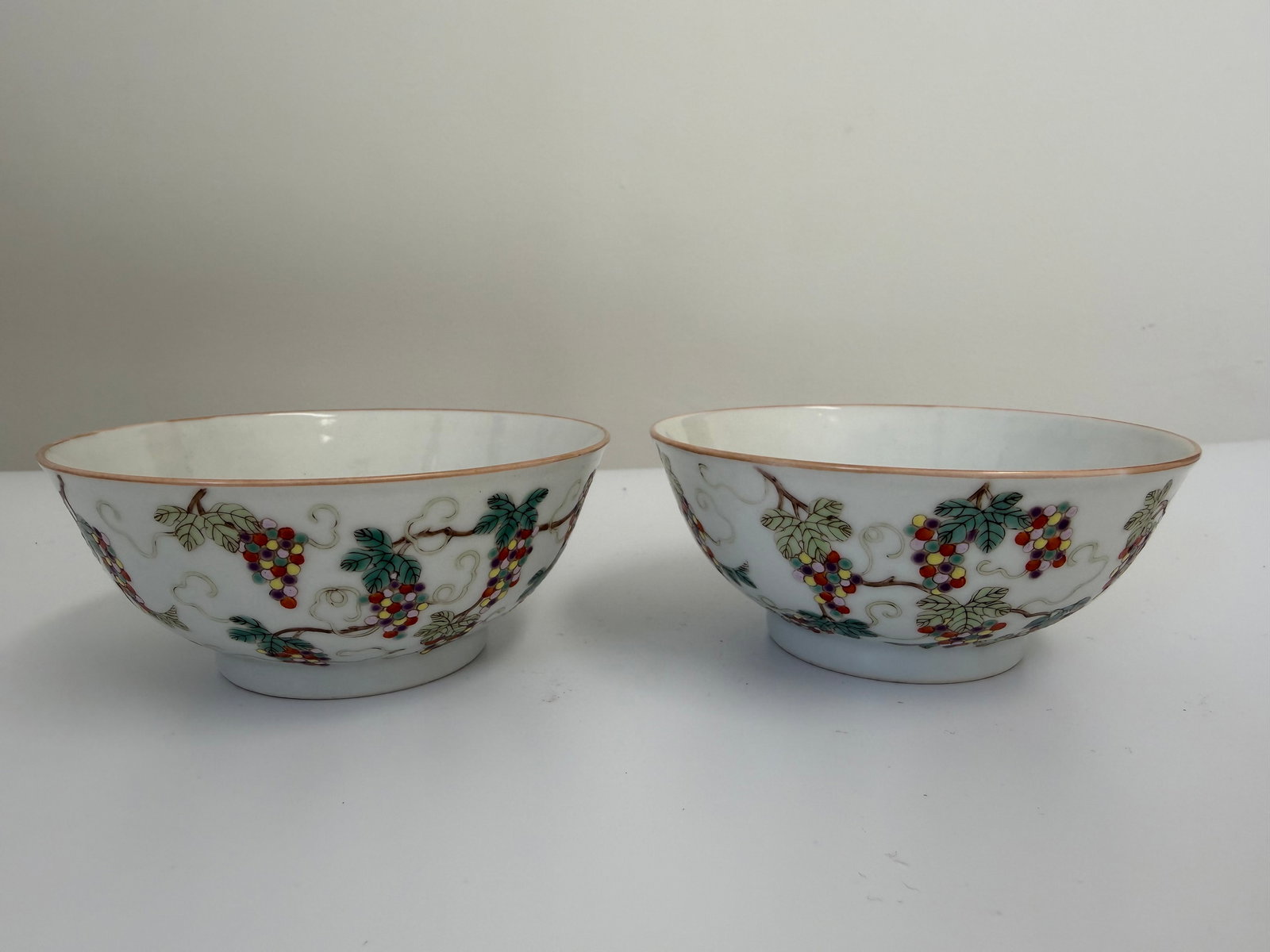Pair of Chinese Enameled famille rose Grape porcelain China bowls mark: Dimension: 3.6 inches/ 9.2 cm. , please note Due to manual measurement, dimensions may vary. Condition: Good used condition, please note buyers are obligated to come to the site to inspect the conditi