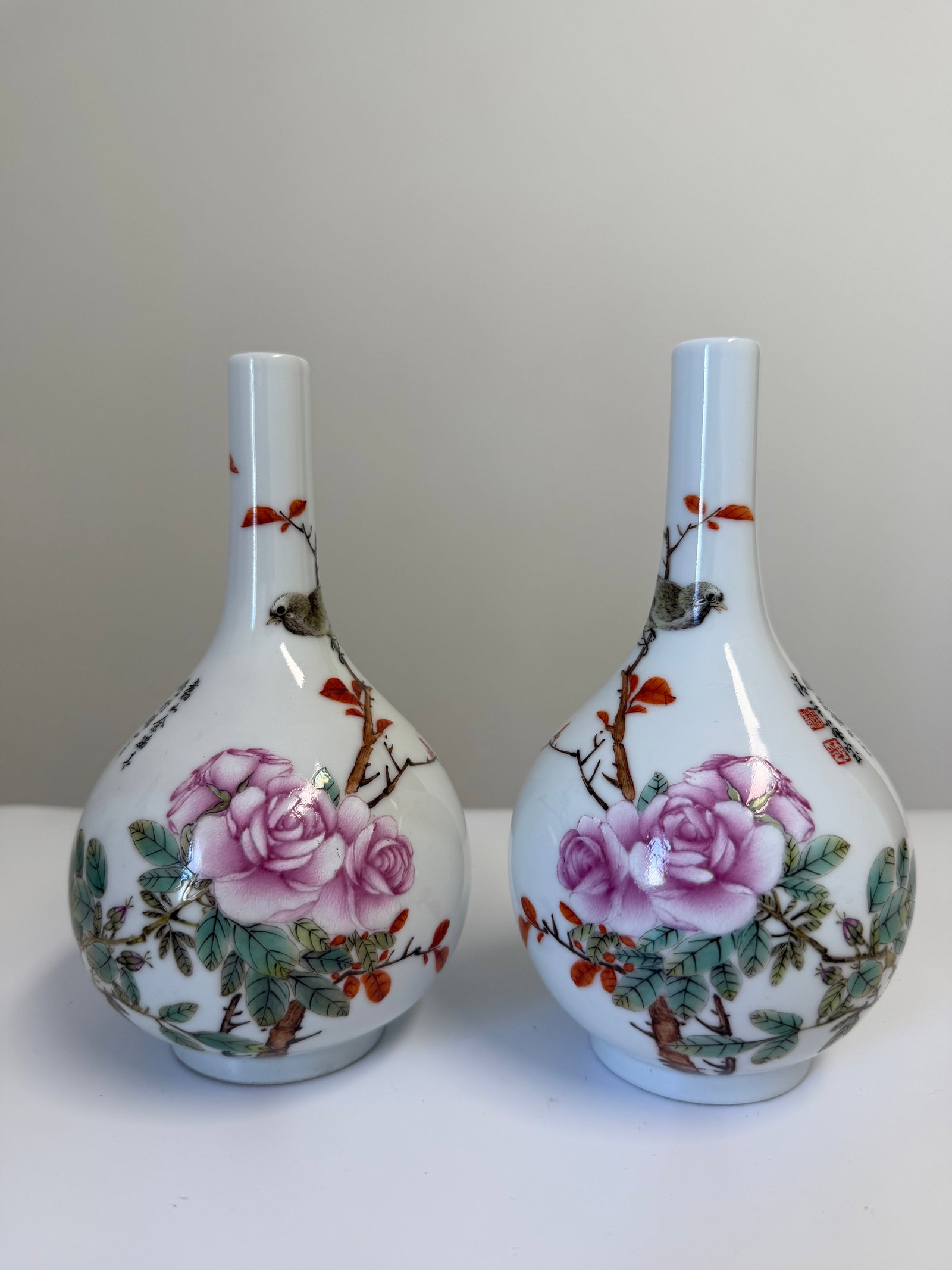 Pair of Chinese Enameled famille rose scholar porcelain China vases: Dimension: the item's tall 7 inches/ 17.8 cm, please note Due to manual measurement, dimensions may vary. Condition: Good used condition, please note buyers are obligated to come to the site to inspec