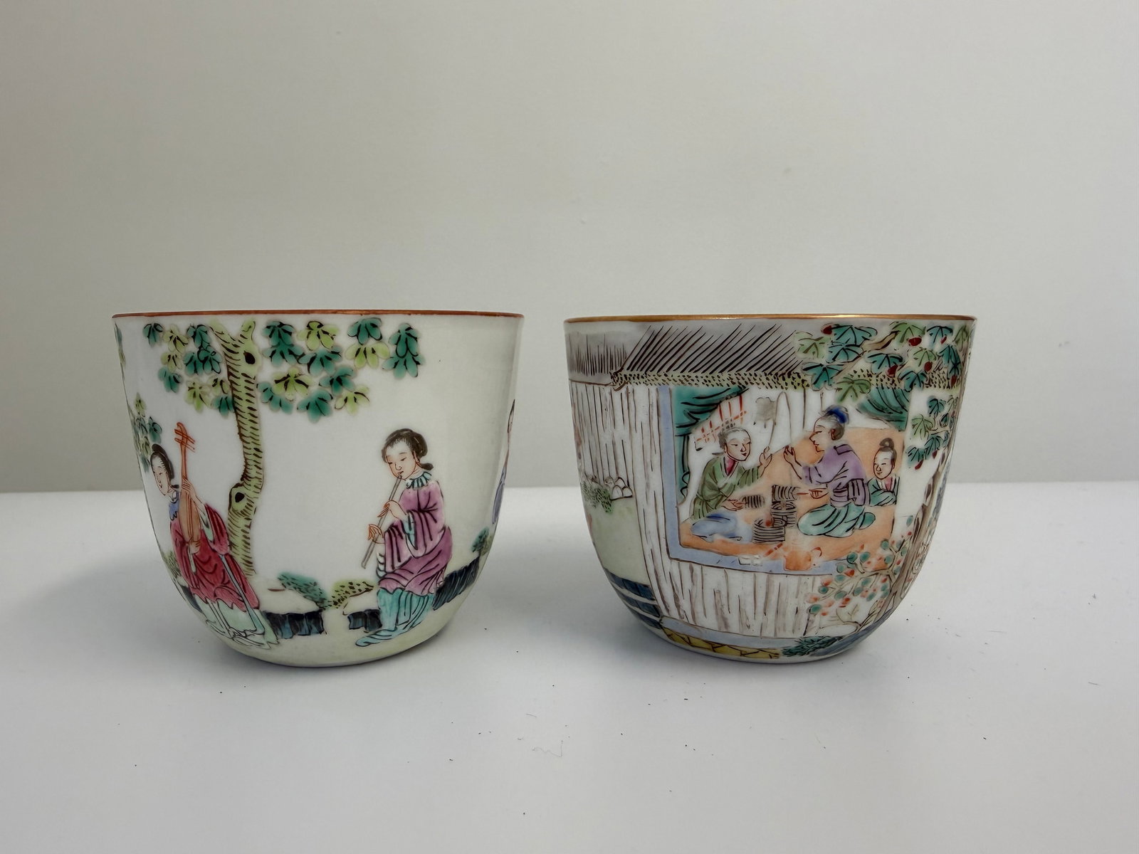 Set of 2 Chinese Enameled famille rose scene porcelain China cups: Dimension: width 3.1 inches/ 7.9 cm, please note Due to manual measurement, dimensions may vary. Condition: Good used condition, please note buyers are obligated to come to the site to inspect the con
