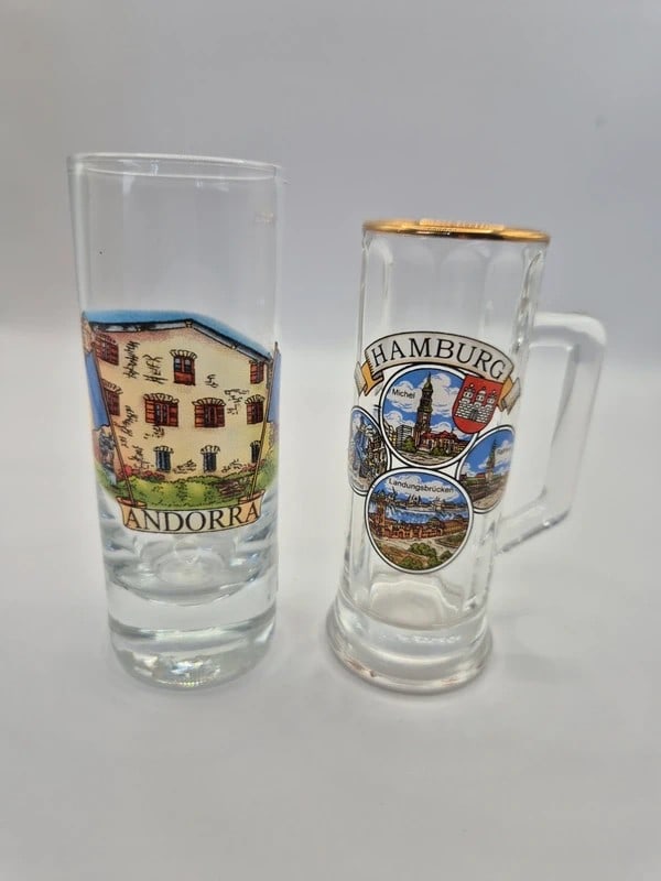 2x Souvenir Shot Glasses Andorra & Hamburg: Dimension: tall 7 inches, please note Due to manual measurement, dimensions may vary. Condition: Good used condition, please note buyers are obligated to come to the site to inspect the condition and 