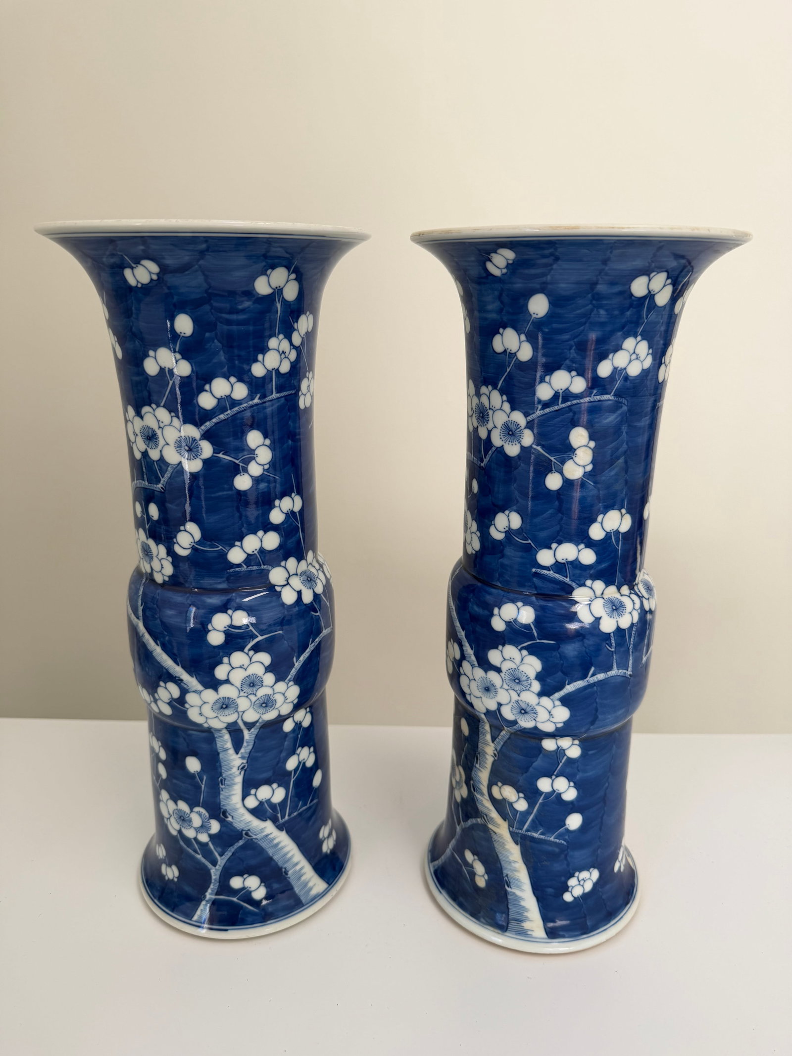 Pair of Chinese blue and white plum bossom porcelain China vases mark: Dimension: tall 13.8 inches/ 35.2 cm, please note Due to manual measurement, dimensions may vary. Condition: Good used condition, please note buyers are obligated to come to the site to inspect the co