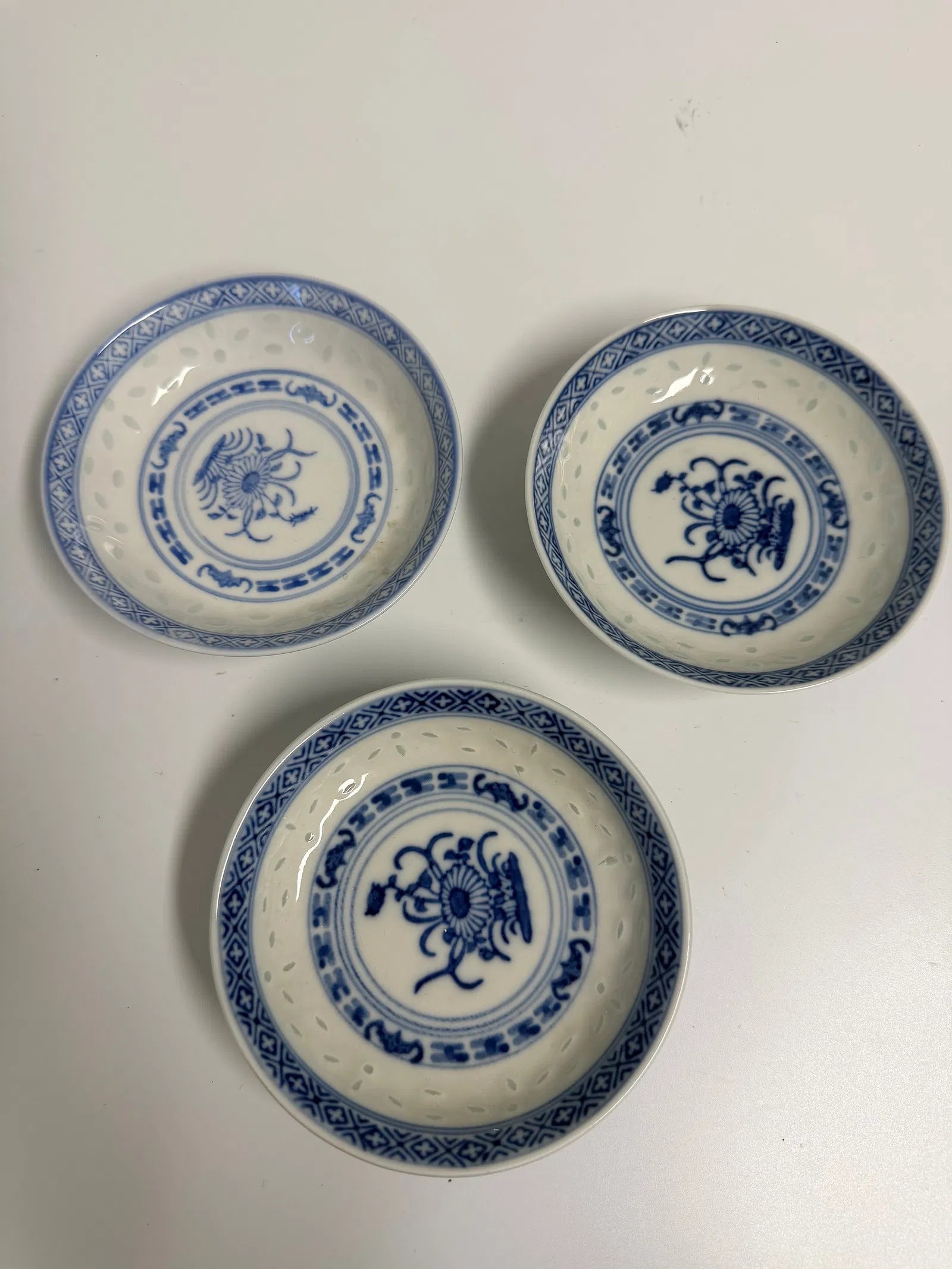 Set of 3 Chinese blue and white rice saucers: Dimension: 3.8 inch / 9.6 cm , please note Due to manual measurement, dimensions may vary. Condition: Good used condition, please note buyers are obligated to come to the site to inspect the condition