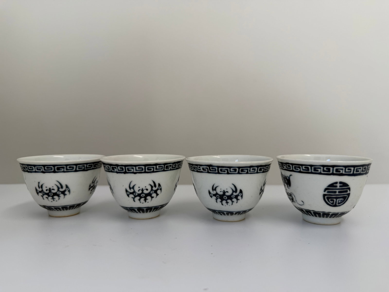 Set of 4 Chinese Enameled famille rose blue patternporcelain China cups: Dimension: 2.8 inch, please note Due to manual measurement, dimensions may vary. Condition: Good used condition, please note buyers are obligated to come to the site to inspect the condition and detai