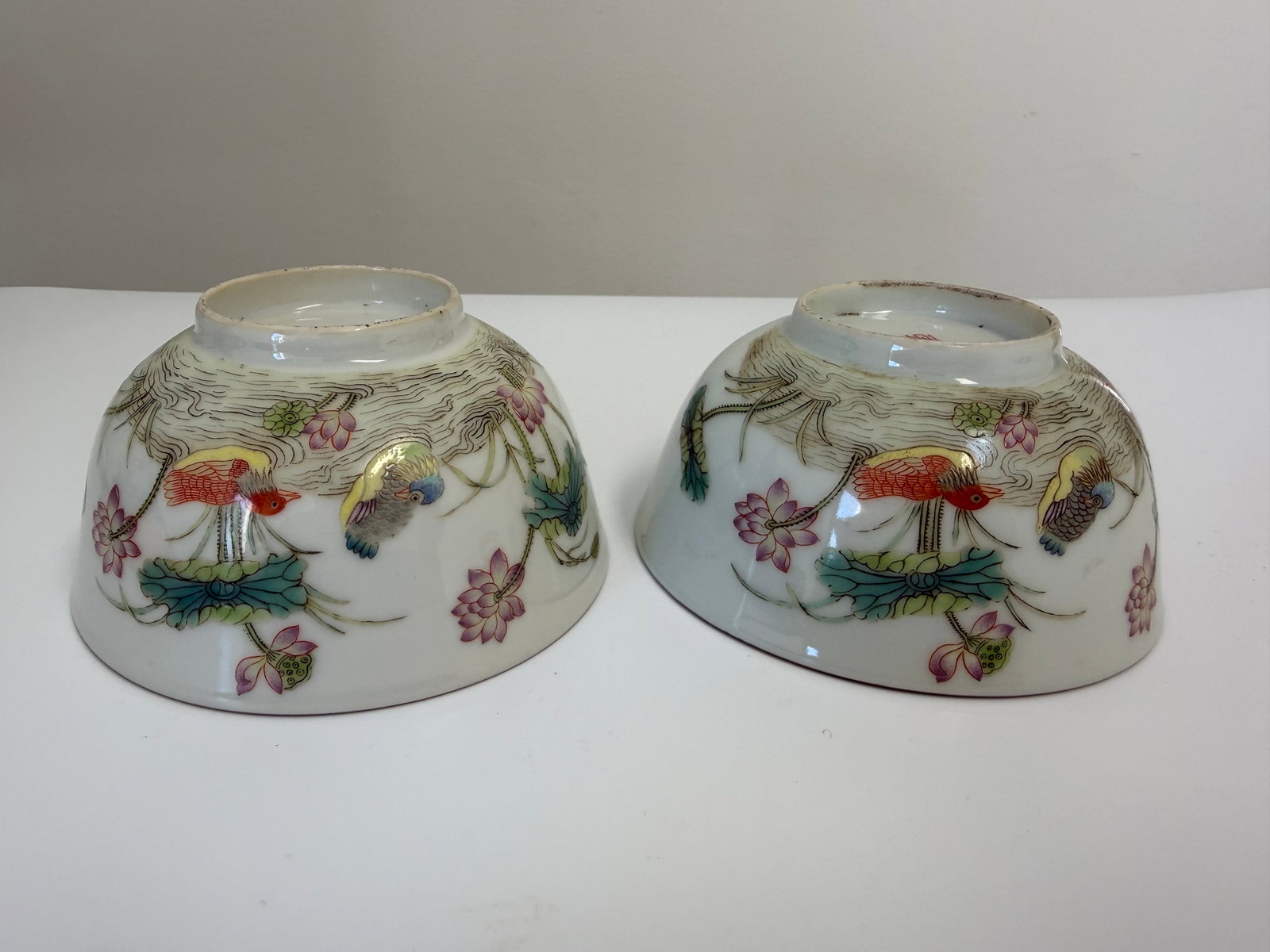 Pair of Chinese Enameled famille rose wild duck porcelain China bowls: Dimension: width 4.5 inch, please note Due to manual measurement, dimensions may vary. Condition: Good used condition, please note buyers are obligated to come to the site to inspect the condition and