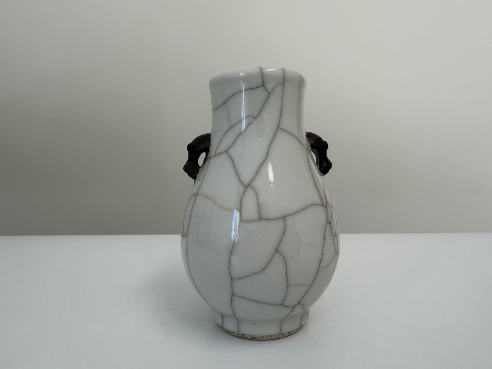 Chinese ice crack glazed porcelain China double ears small vase: Dimension: 4 inch, please note Due to manual measurement, dimensions may vary. Condition: Good used condition, please note buyers are obligated to come to the site to inspect the condition and details