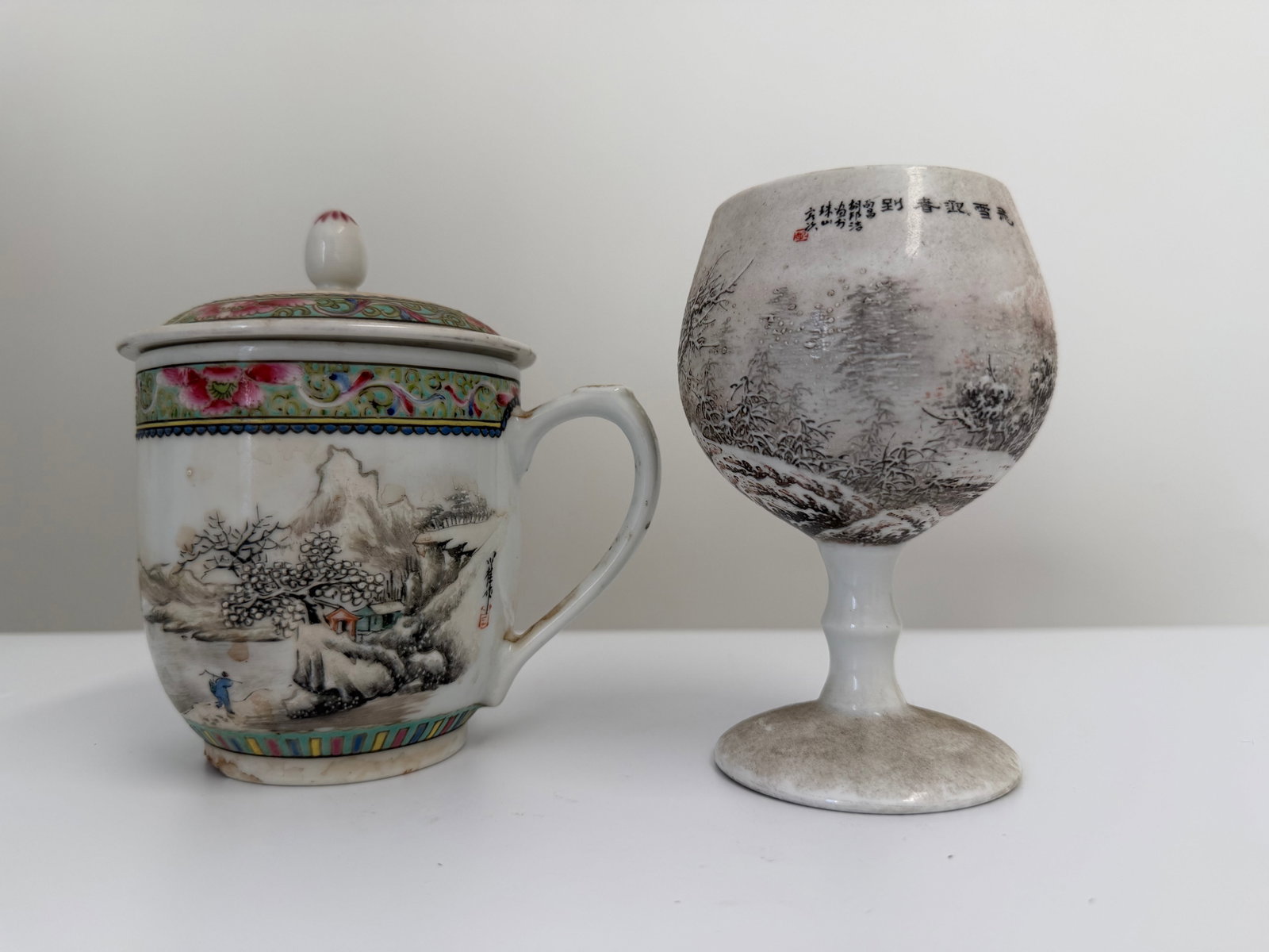 Set of 2 Chinese Enameled famille rose snow landscape porcelain cups: Dimension: the foot cup tall 5 inch, please note Due to manual measurement, dimensions may vary. Condition: Good used condition, please note buyers are obligated to come to the site to inspect the con