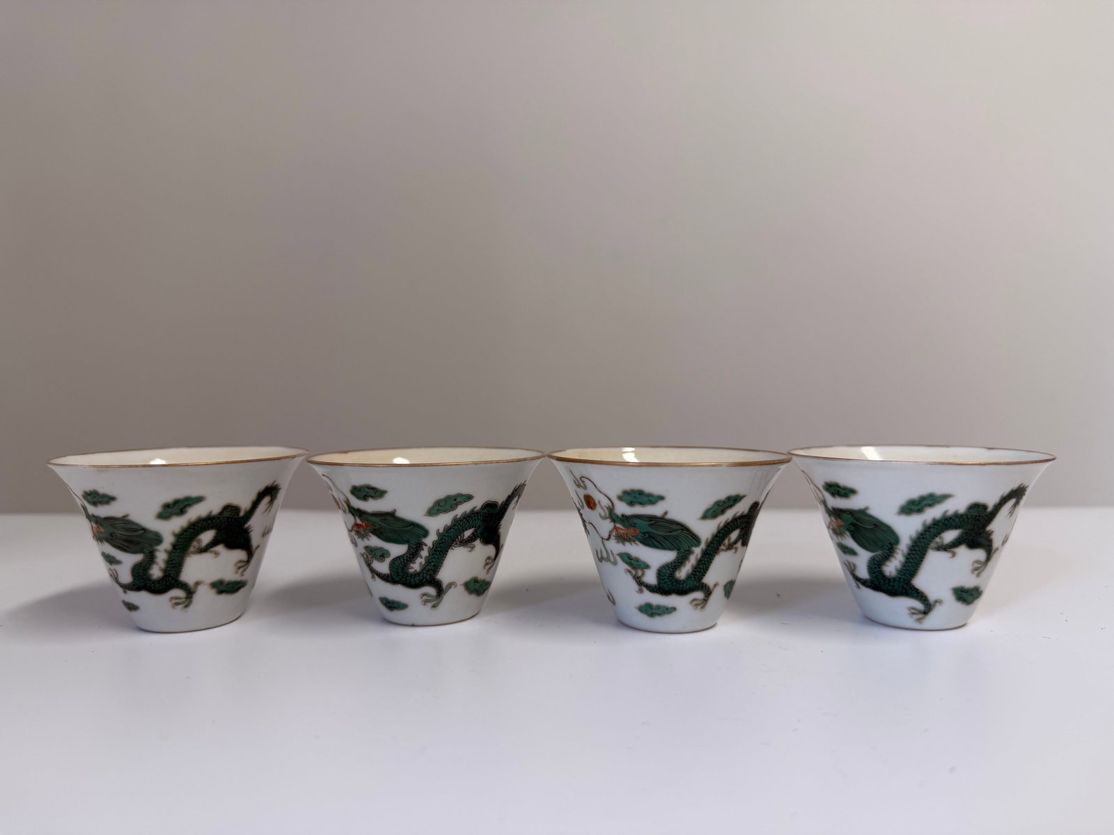 Set of 4 Chinese Enameled famille rose green dragons porcelain China cups: Dimension: 2.6 inch, please note Due to manual measurement, dimensions may vary. Condition: Good used condition, please note buyers are obligated to come to the site to inspect the condition and detai