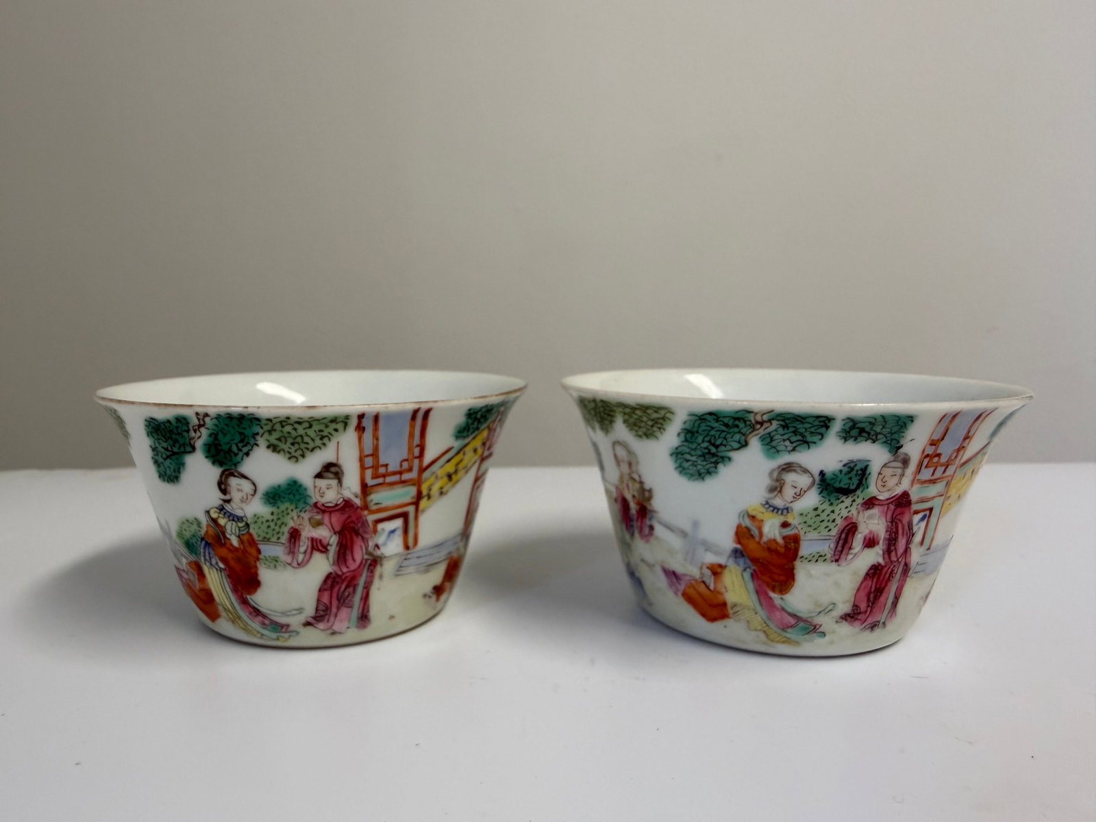 Pair Of Chinese Enameled famille rose scene porcelain China cups: Dimension: 3.5 inch, please note Due to manual measurement, dimensions may vary. Condition: Good used condition, please note buyers are obligated to come to the site to inspect the condition and detai