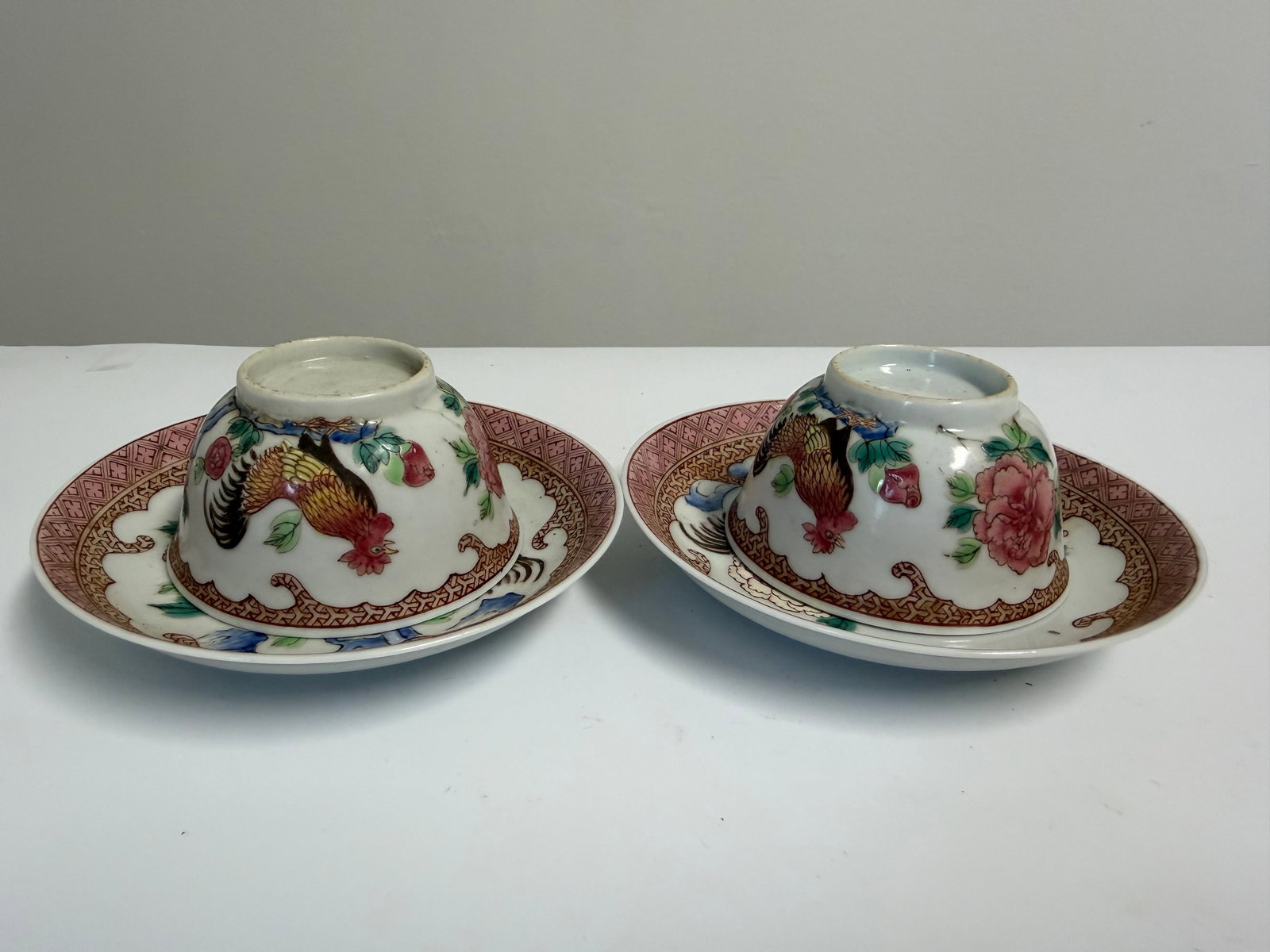 Pair of Chinese Enameled famille rose Rooster porcelain China saucers and cups: Dimension: 4.5/2.7 inch, please note Due to manual measurement, dimensions may vary. , please note buyers are obligated to come to the site to inspect the condition and details of the item. condition