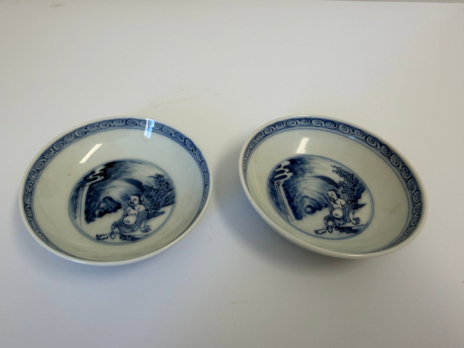Pair of Chinese antique blue and white man porcelain China saucers: Dimension: 3.4 inch, please note Due to manual measurement, dimensions may vary. , please note buyers are obligated to come to the site to inspect the condition and details of the item. condition repo