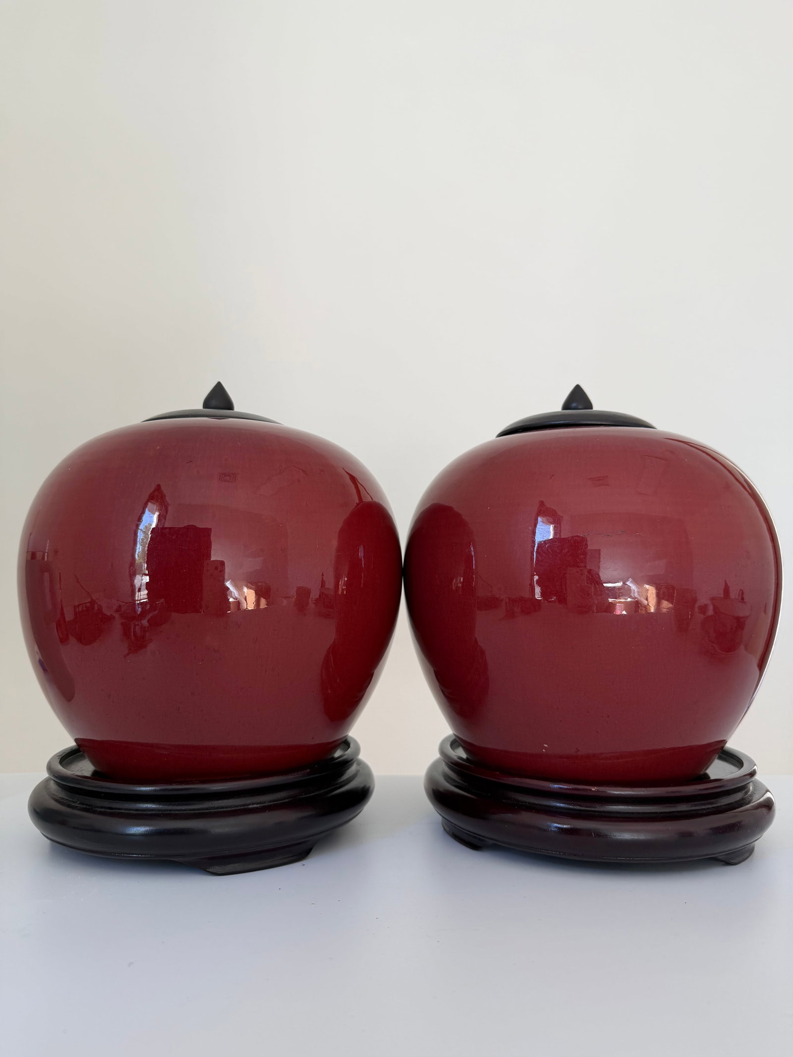 Pair of Chinese red glazed OX BLOOD BOEUF porcelain jars with wooden lids and stands (1 of 14)