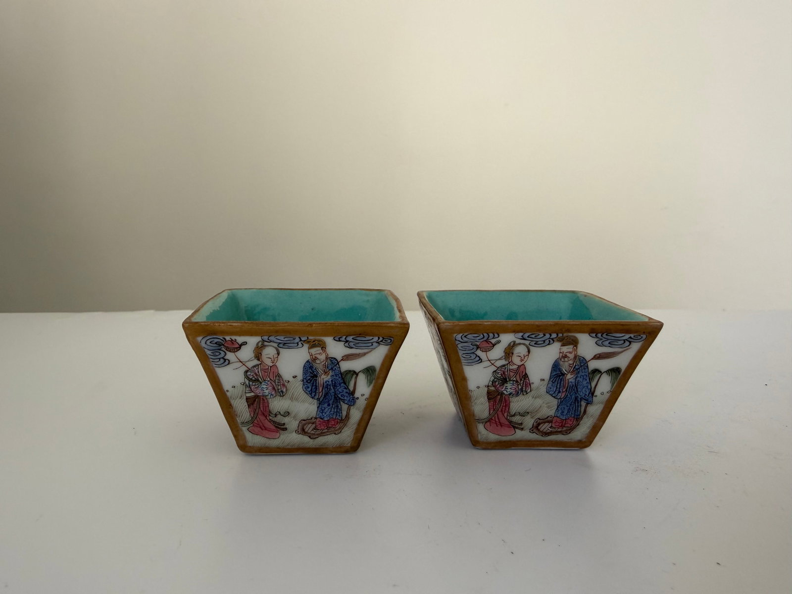 Pair of Chinese Enameled famille rose figures porcelain China square cups: Dimension: 2 inch, please note Due to manual measurement, dimensions may vary. , please note buyers are obligated to come to the site to inspect the condition and details of the item. condition