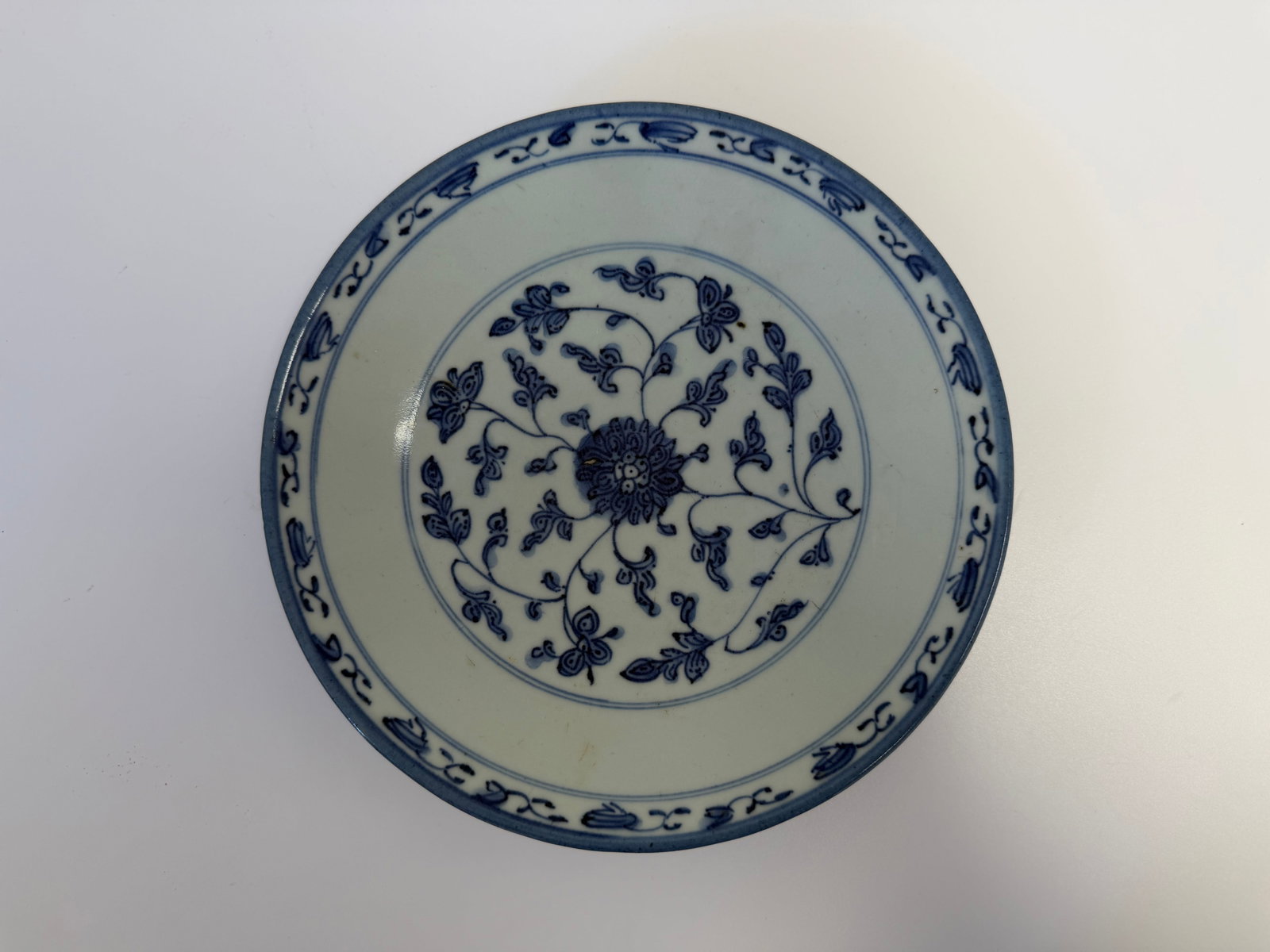 Chinese blue and white lotus plate with mark: Dimension: 7.7 inches , please note Due to manual measurement, dimensions may vary. Condition: Good used condition, please note buyers are obligated to come to the site to inspect the condition and de