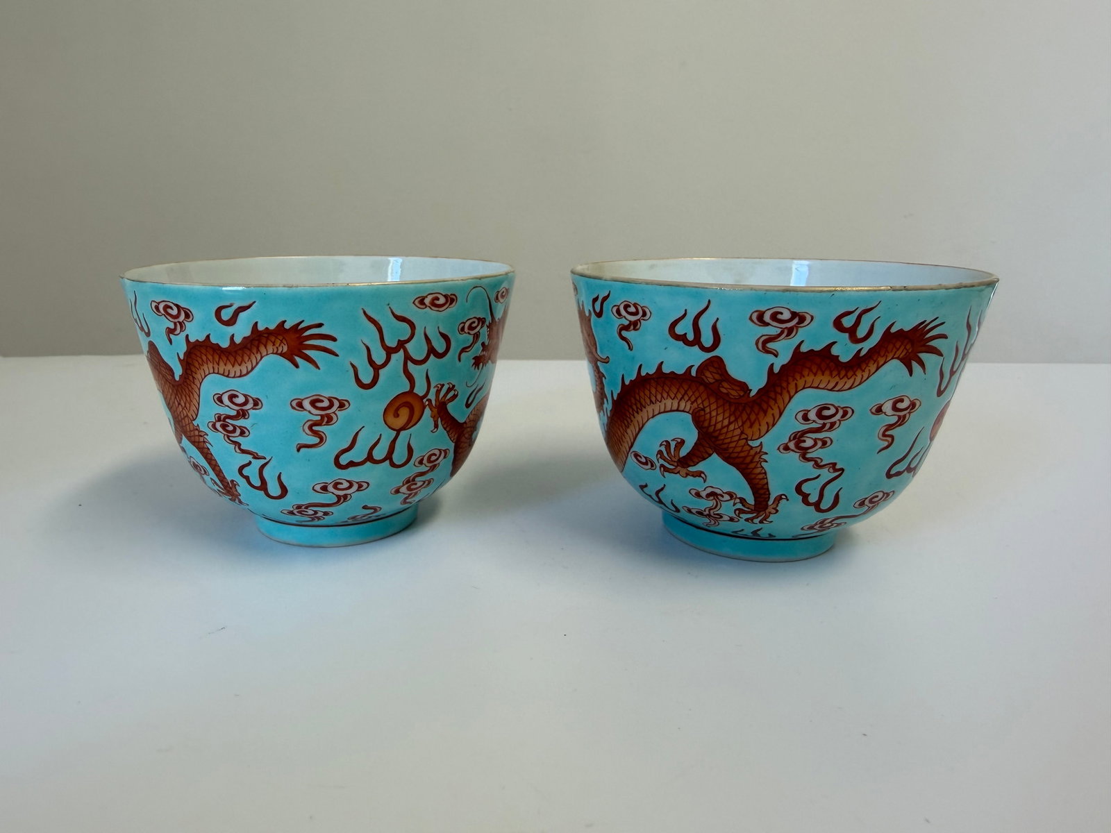 Pair of Chinese enamel famille rose red dragons porcelain China cups red mark: Dimension: 3.3 inches , please note Due to manual measurement, dimensions may vary. Condition: Good used condition, please note buyers are obligated to come to the site to inspect the condition and de