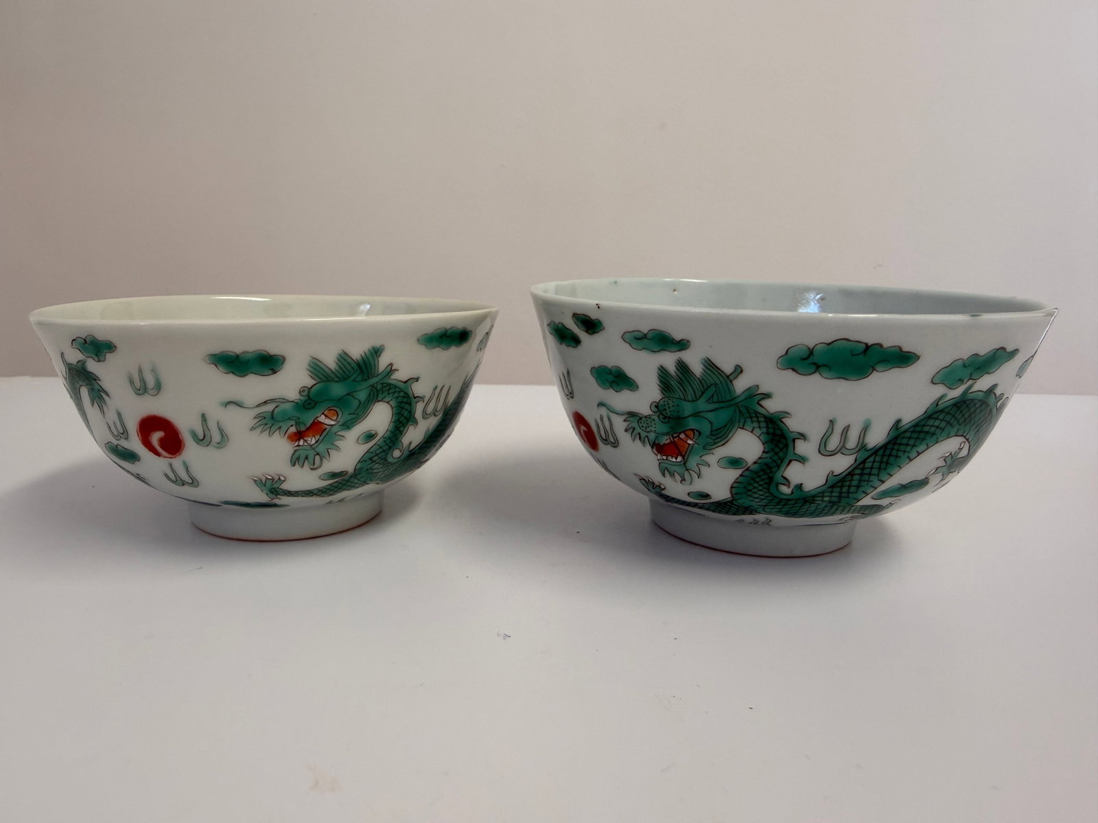 Pair of Chinese enamel famille rose green dragons porcelain bowl: Dimension: 4.5-4.7 inches , please note Due to manual measurement, dimensions may vary. Condition: Good used condition, please note buyers are obligated to come to the site to inspect the condition an
