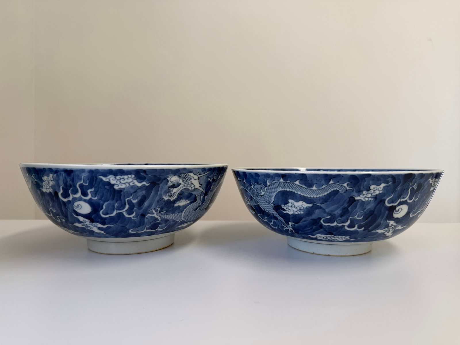 Pair Chinese antique blue and white dragons porcelain China bowls with kangxi mark: Dimension: 9-9.25 inches , please note Due to manual measurement, dimensions may vary. Condition: Good used condition, please note buyers are obligated to come to the site to inspect the condition