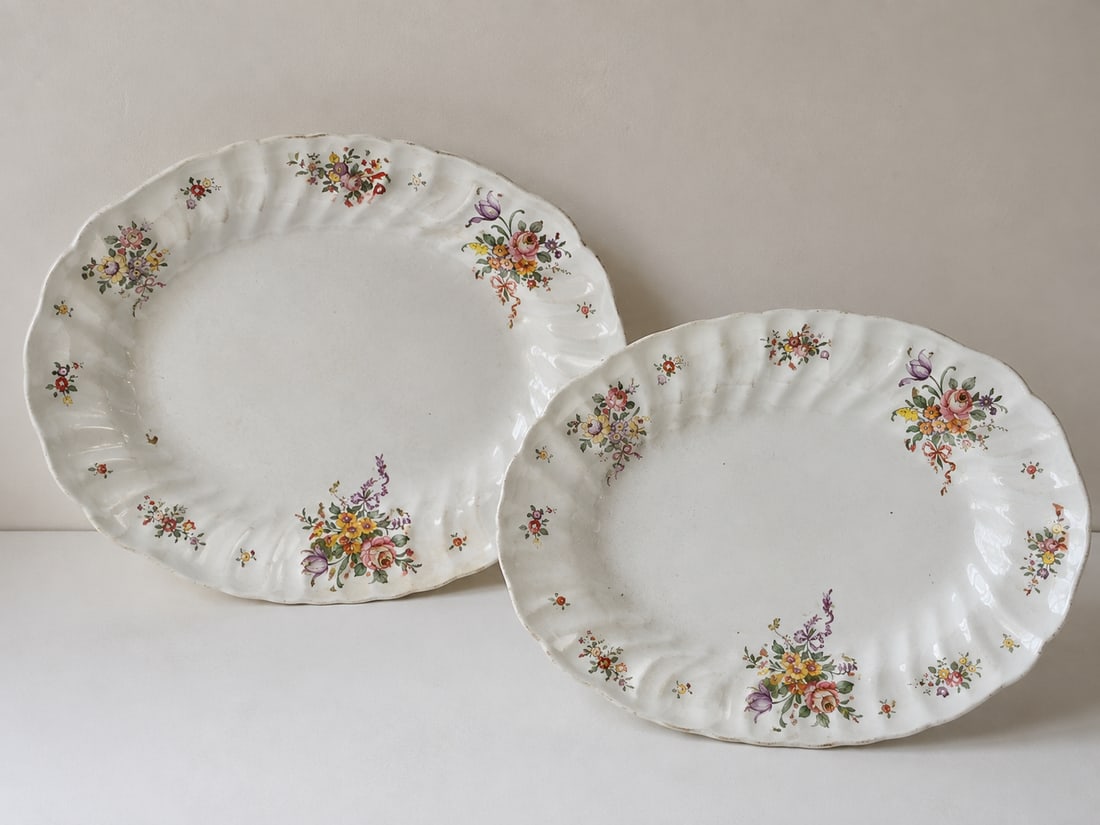 Pair of Vintage Floral Porcelain Serving Platters with Scalloped Rims: Dimension: 12 inches , please note Due to manual measurement, dimensions may vary. Condition: Good used condition, please note buyers are obligated to come to the site to inspect the condition and