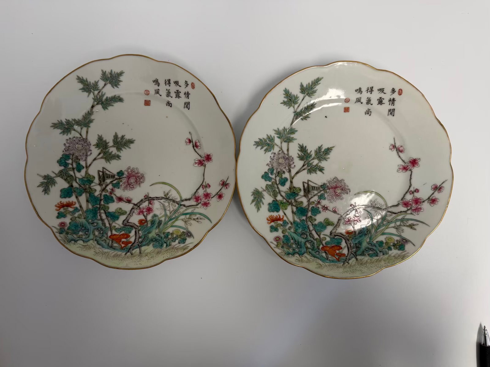 Pair of Chinese enamel famille rose bamboo porcelain plates with China characters mark: Dimension: 9 inches , please note Due to manual measurement, dimensions may vary. Condition: Good used condition, please note buyers are obligated to come to the site to inspect the condition and deta