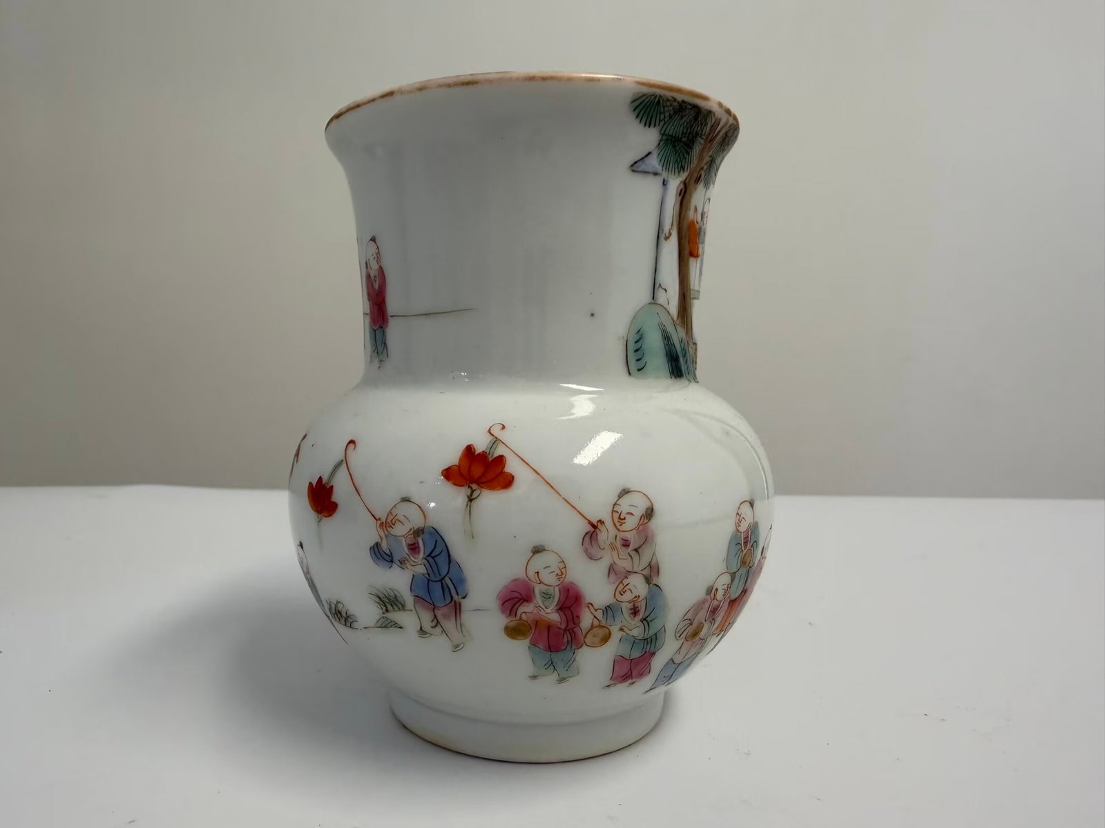 Chinese famille rose porcelain children vase: Dimension: 4 inches , please note Due to manual measurement, dimensions may vary. Condition: Good used condition, please note buyers are obligated to come to the site to inspect the condition and deta
