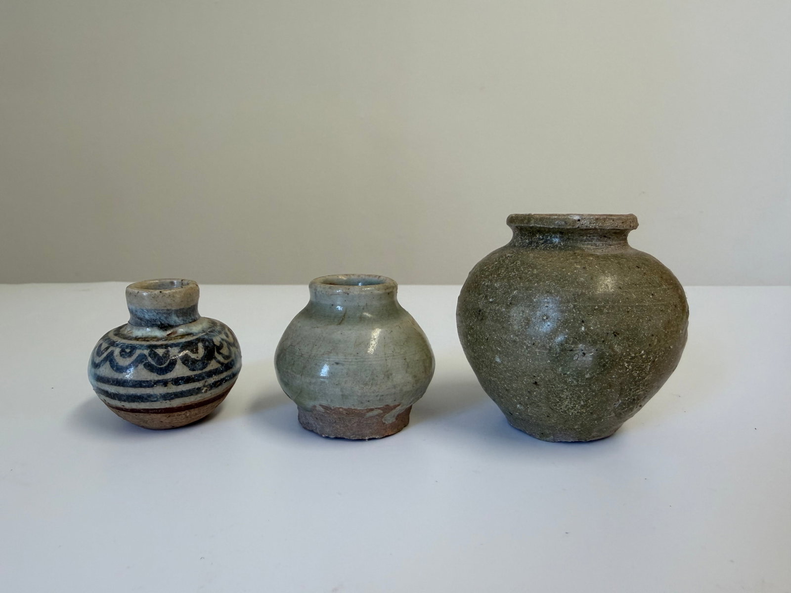 Set of 3 Chinese green glazed porcelain pots: Dimension: 2-3 inches , please note Due to manual measurement, dimensions may vary. Condition: Good used condition, please note buyers are obligated to come to the site to inspect the condition and