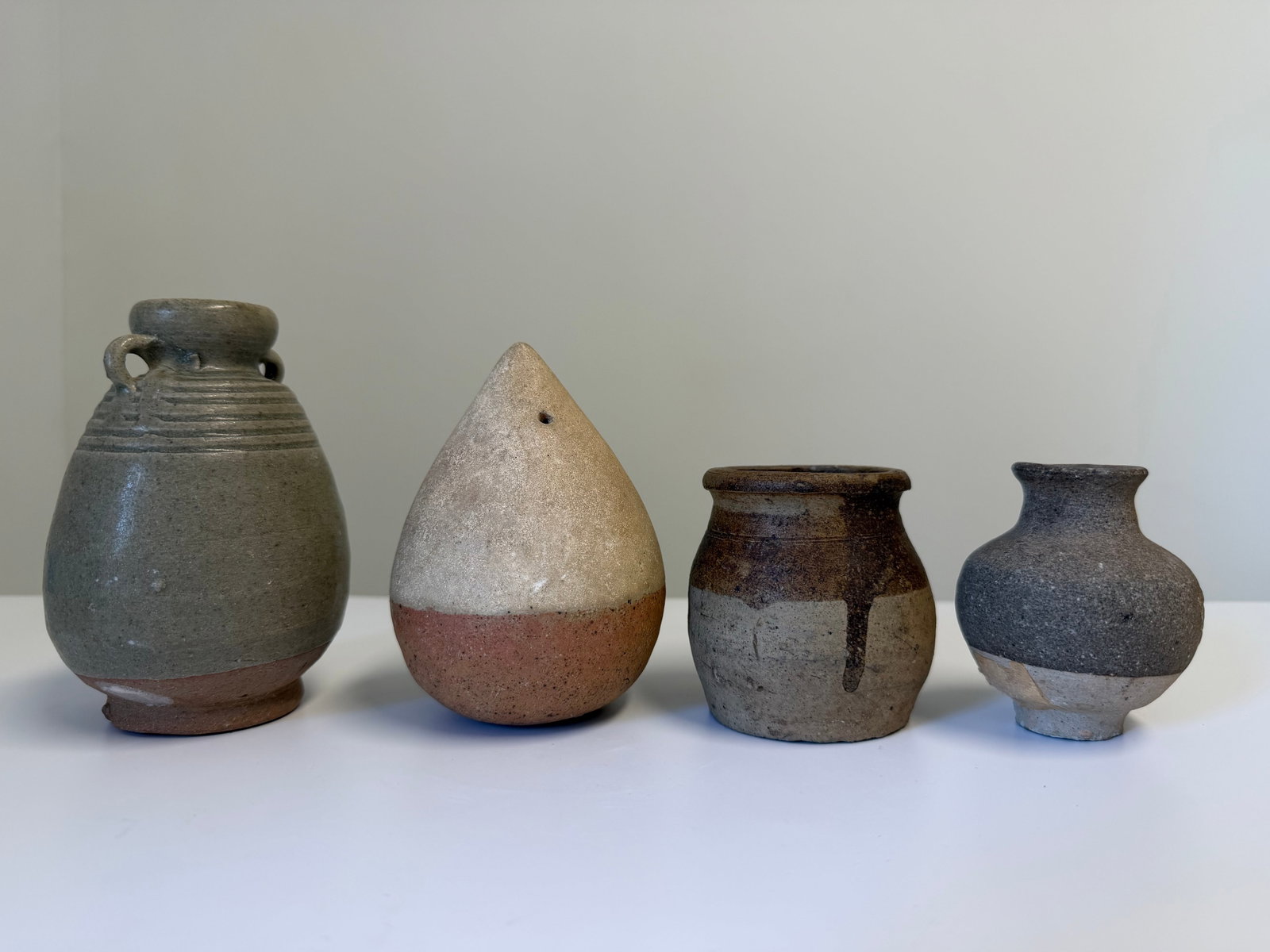 Set of 4 Chinese green glazed porcelain pots: Dimension: 3-5 inches , please note Due to manual measurement, dimensions may vary. Condition: Good used condition, please note buyers are obligated to come to the site to inspect the condition and de