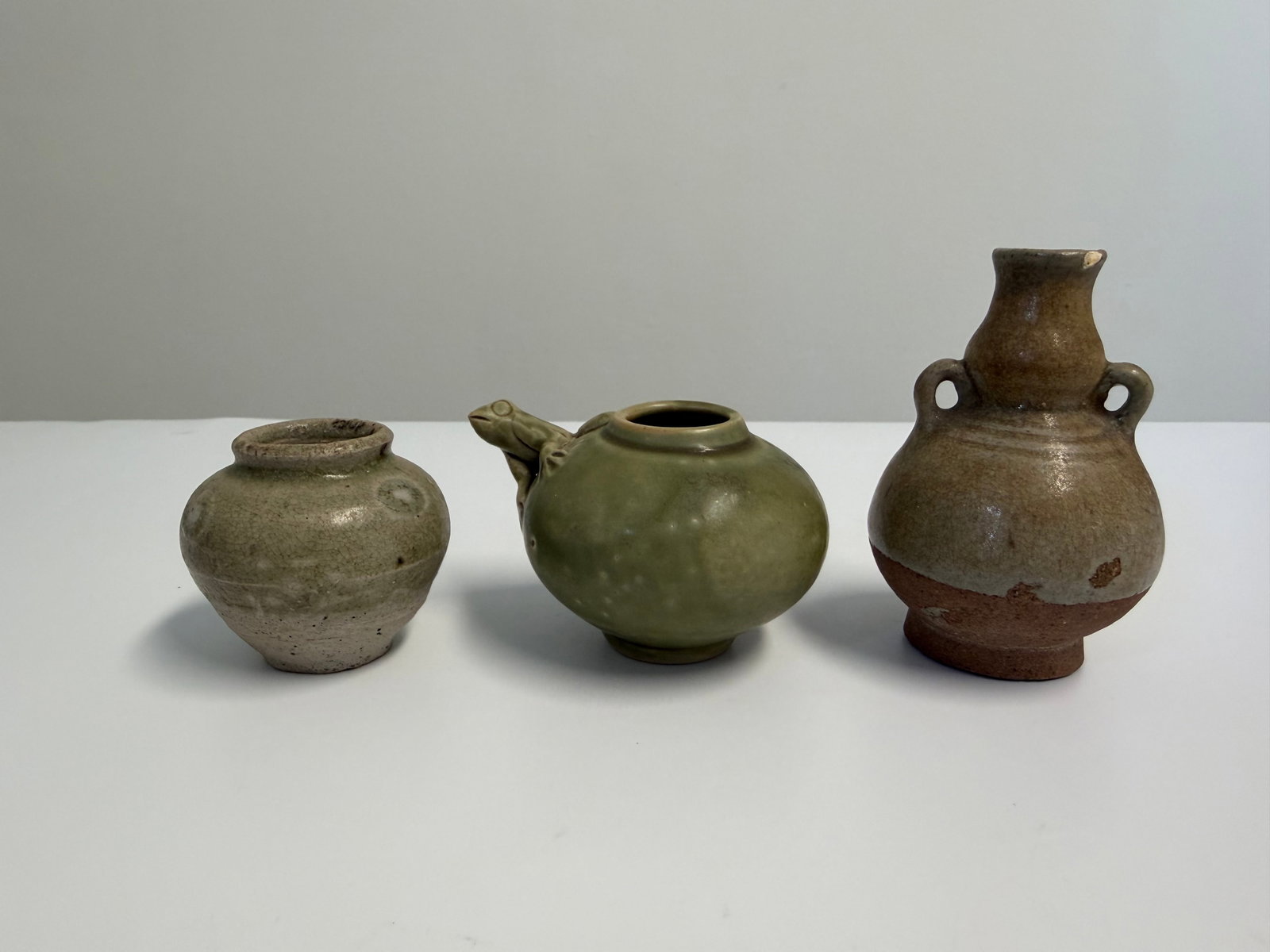 Set of 3 Chinese green glazed porcelain pots: Dimension: 2-4 inches , please note Due to manual measurement, dimensions may vary. Condition: Good used condition, please note buyers are obligated to come to the site to inspect the condition and de